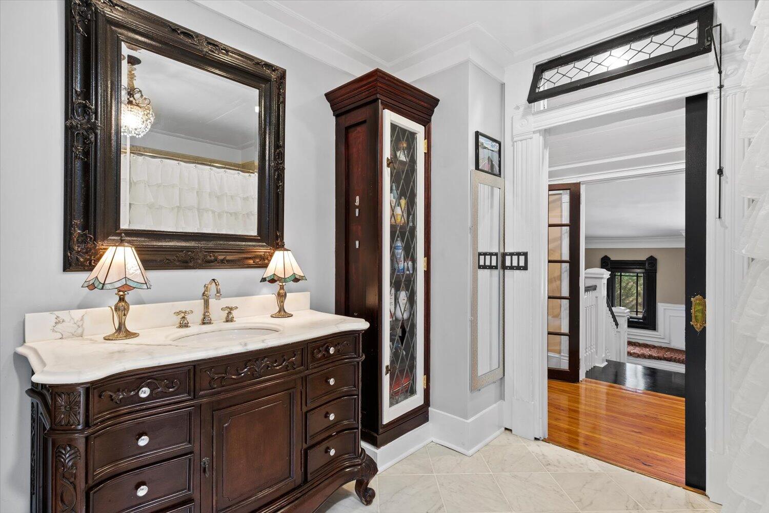 54 Plateau Avenue DeFuniak Springs, FL 32435 - Photo 51 of 114 a bathroom with a double vanity sink mirror and shower
