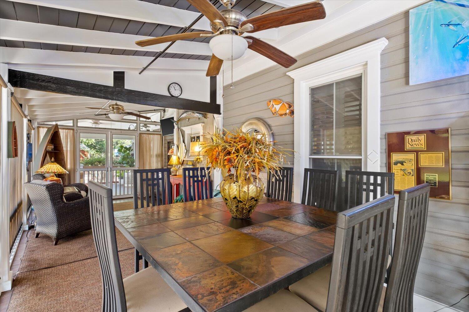 54 Plateau Avenue DeFuniak Springs, FL 32435 - Photo 59 of 114 a view of a dining room with furniture wooden floor and chandelier
