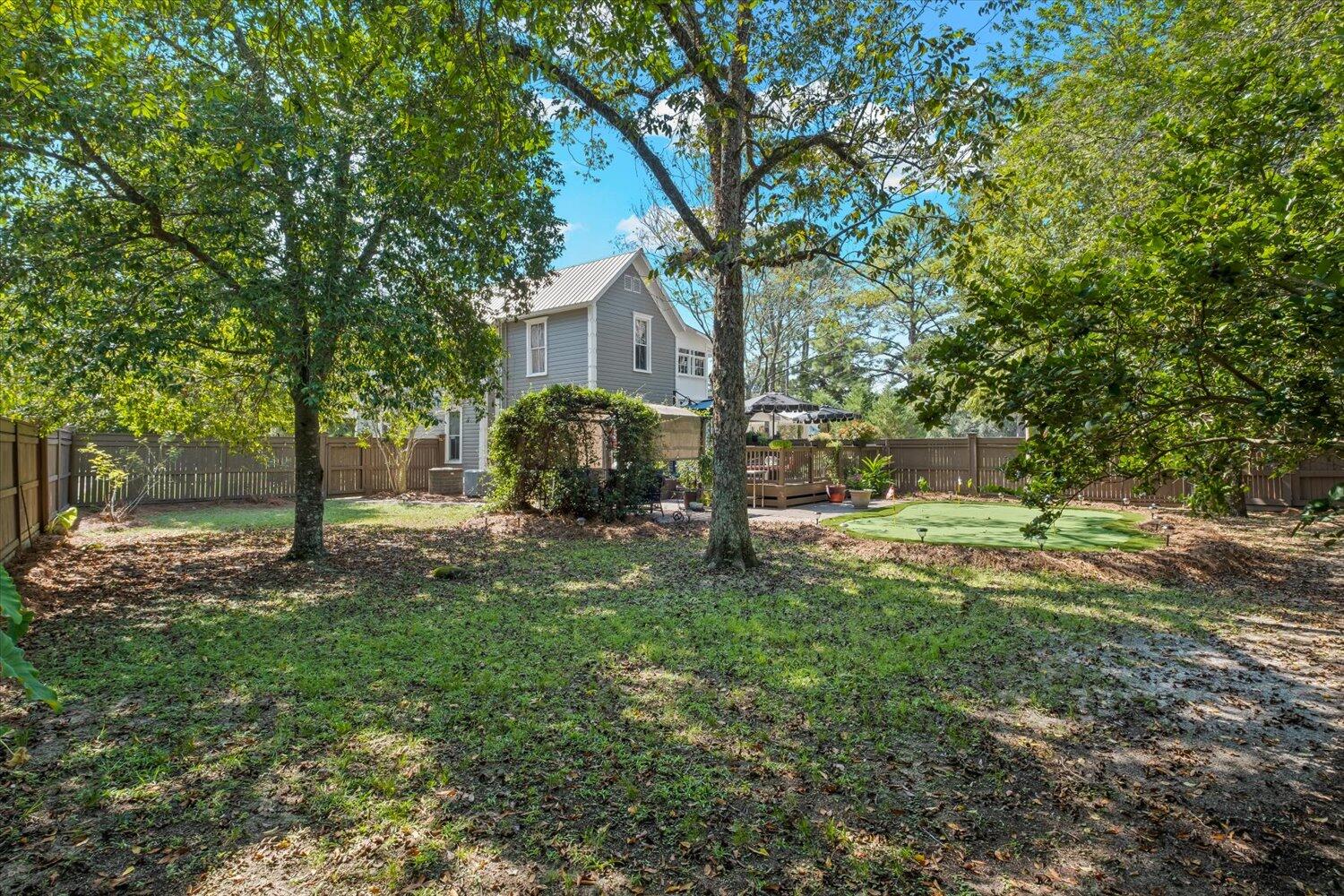 54 Plateau Avenue DeFuniak Springs, FL 32435 - Photo 67 of 114 a front view of a house with a yard