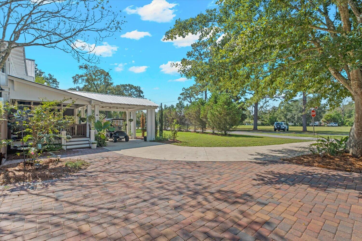54 Plateau Avenue DeFuniak Springs, FL 32435 - Photo 69 of 114 a view of a house with a big yard
