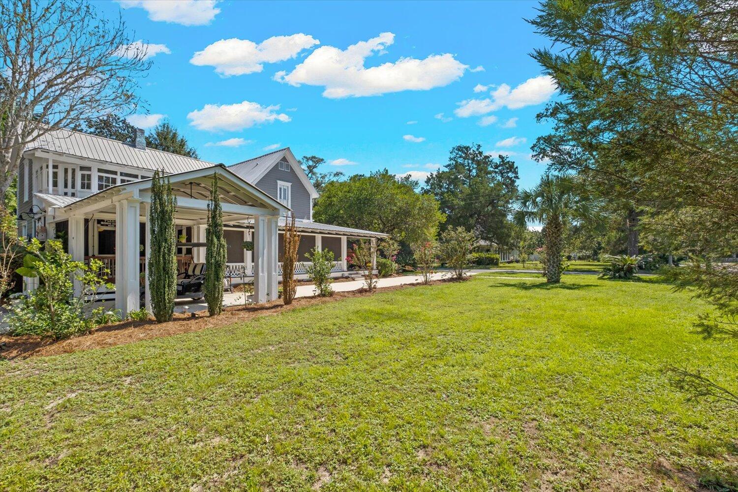 54 Plateau Avenue DeFuniak Springs, FL 32435 - Photo 71 of 114 a view of a house with a big yard