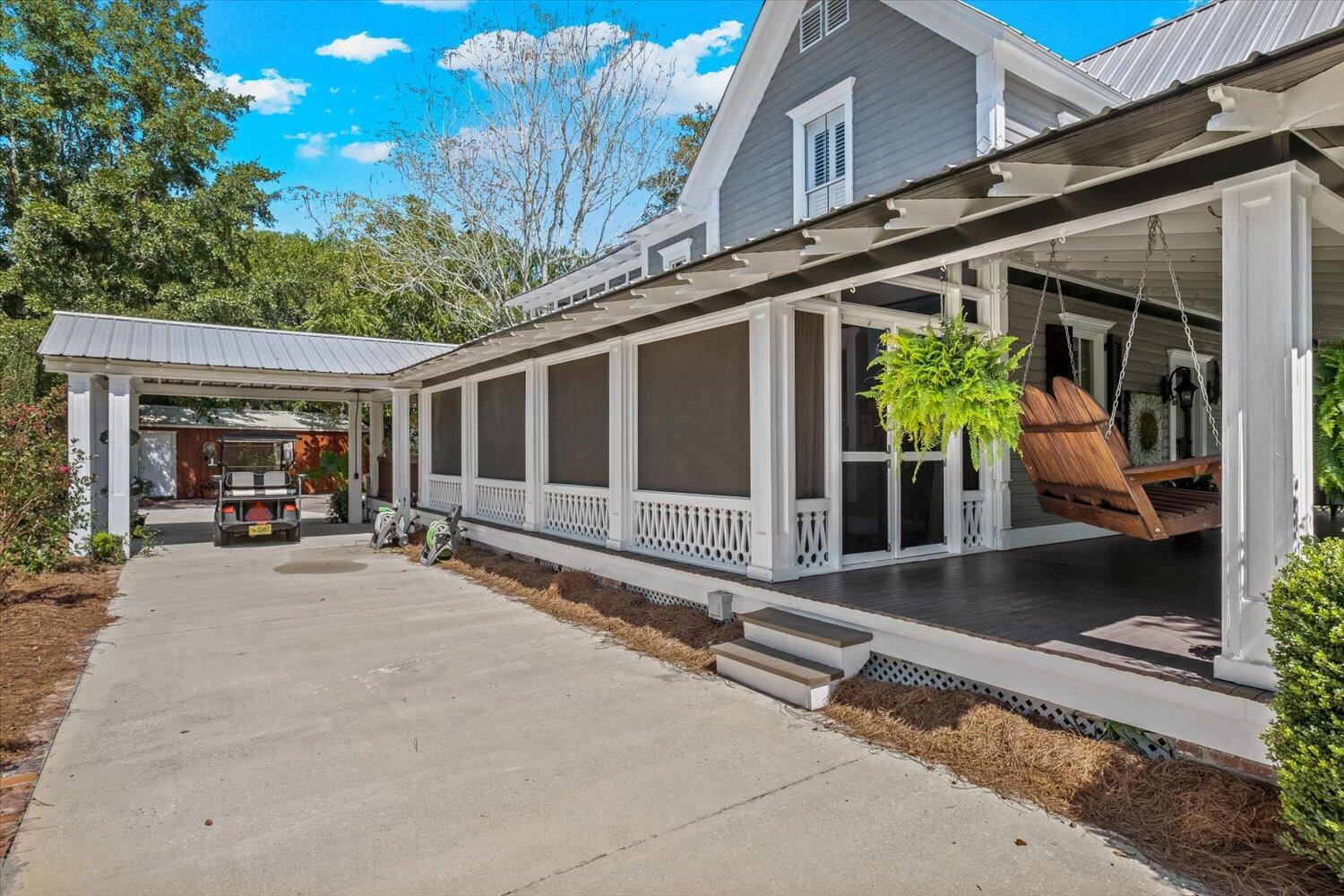 54 Plateau Avenue DeFuniak Springs, FL 32435 - Photo 79 of 114 a view of a house with porch and furniture