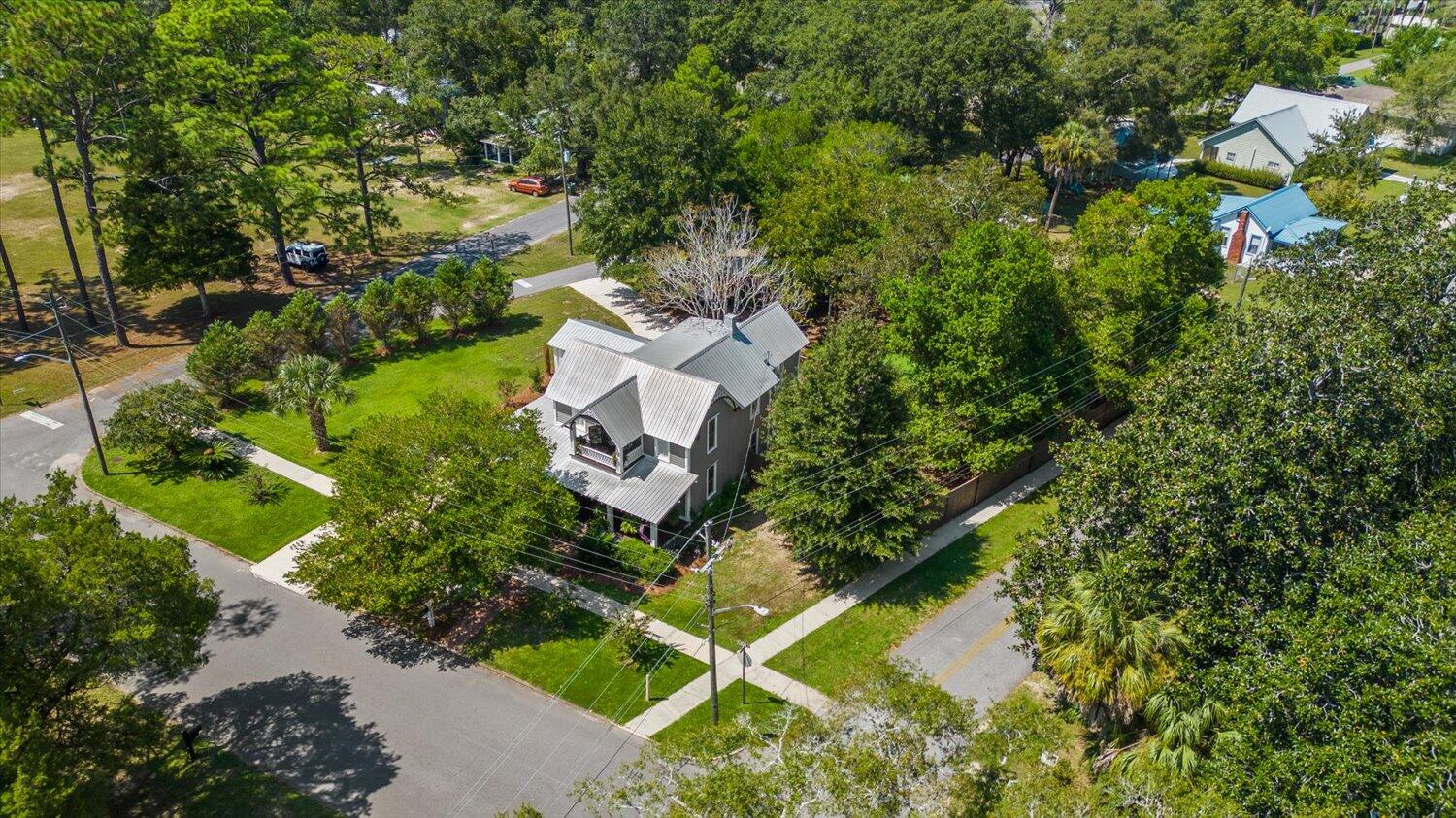 54 Plateau Avenue DeFuniak Springs, FL 32435 - Photo 100 of 114 an aerial view of a house with a yard