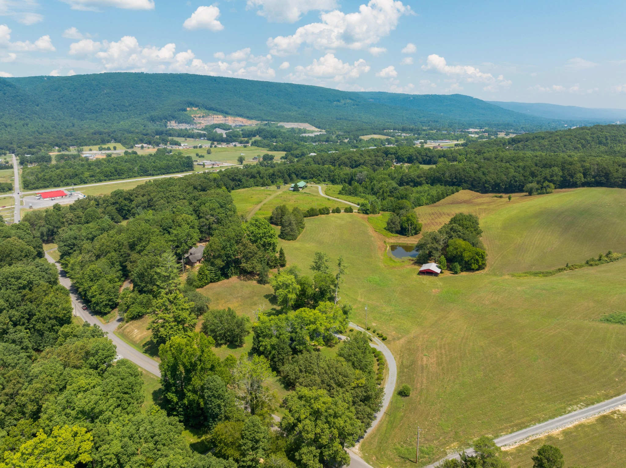 0 John Burch Road West Dunlap, TN 37327 - Photo 24 of 29 a view of a lake with a city