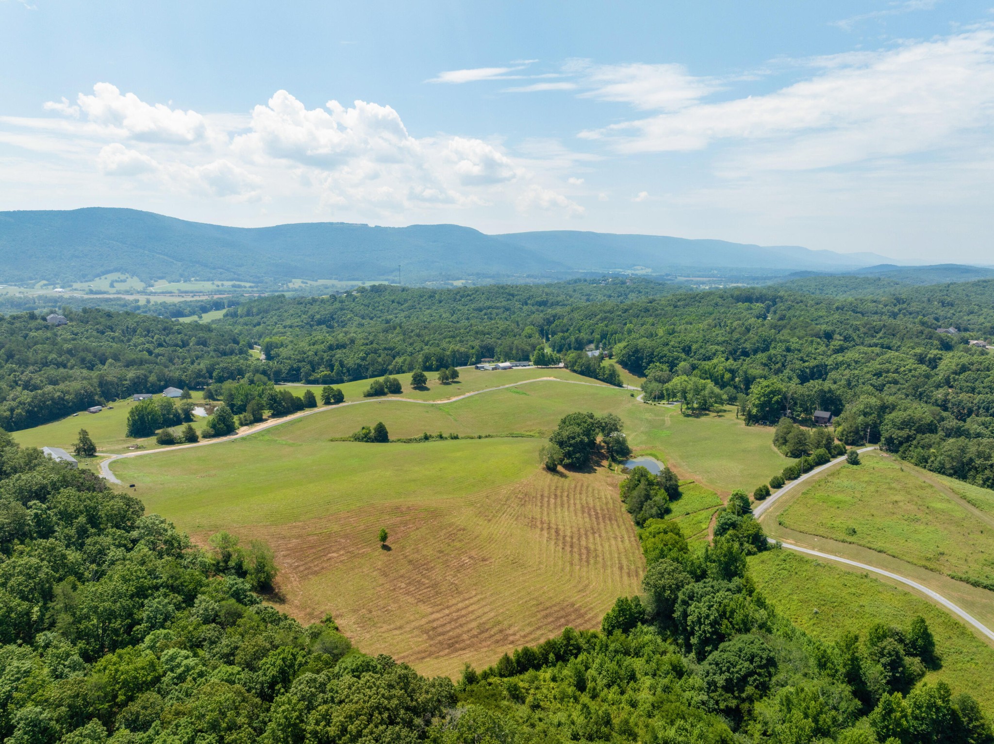 0 John Burch Road West Dunlap, TN 37327 - Photo 3 of 29 an aerial view of residential house with outdoor space and trees all around