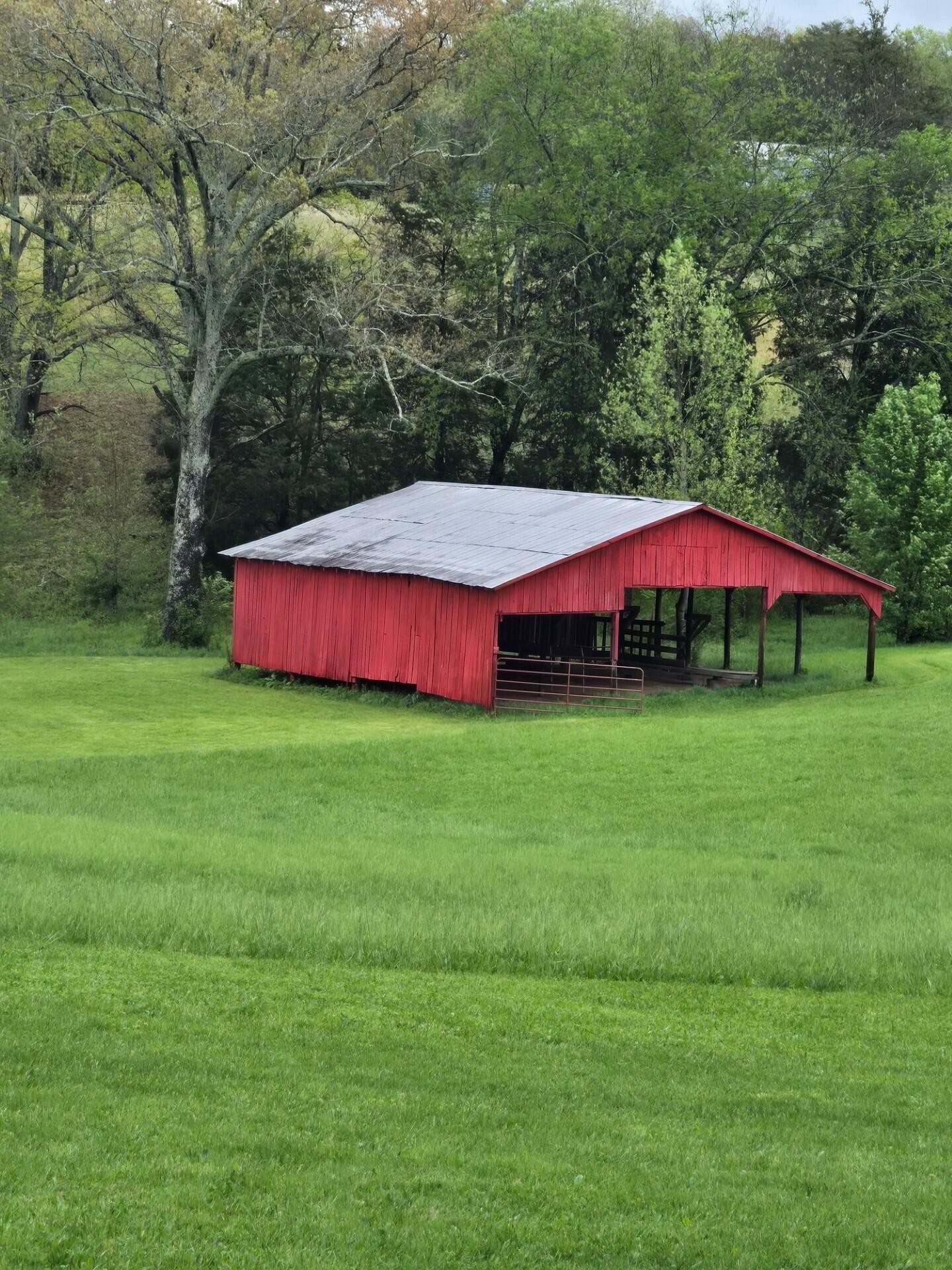 0 John Burch Road West Dunlap, TN 37327 - Photo 8 of 29 a view of a backyard with a garden and fire pit