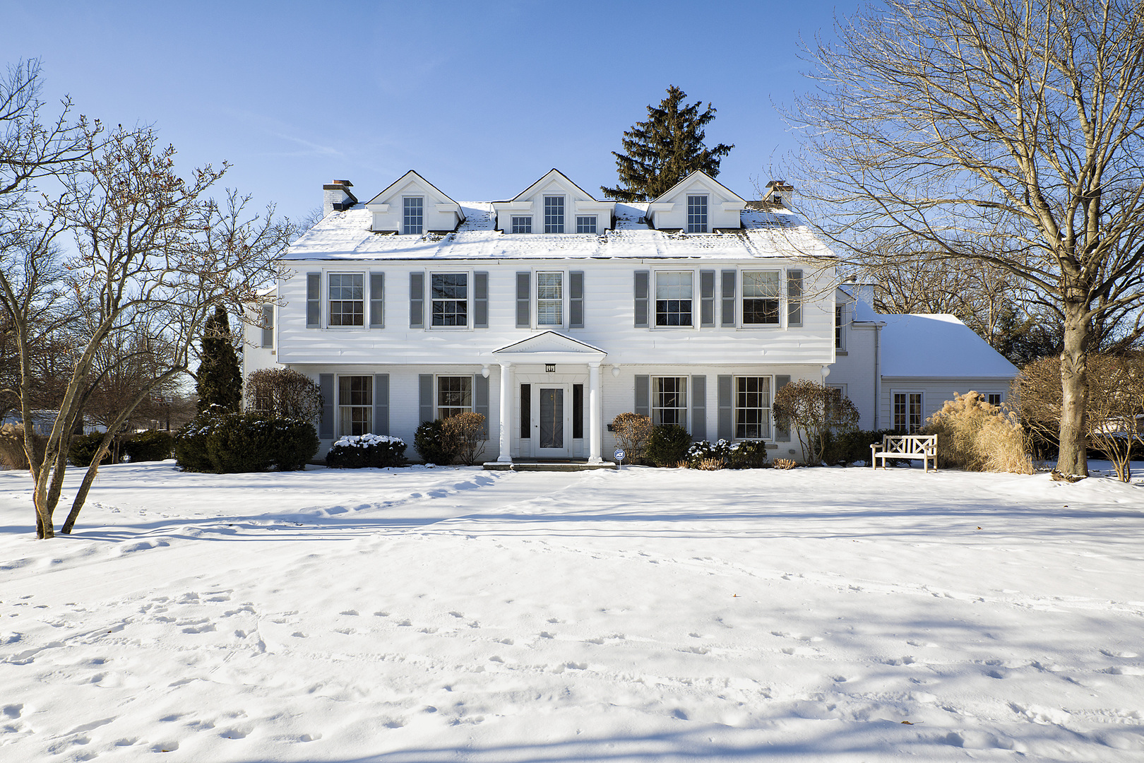 834 Valley Road Glencoe, IL 60022 - Photo 1 of 25 a white house with a large tree in front of it