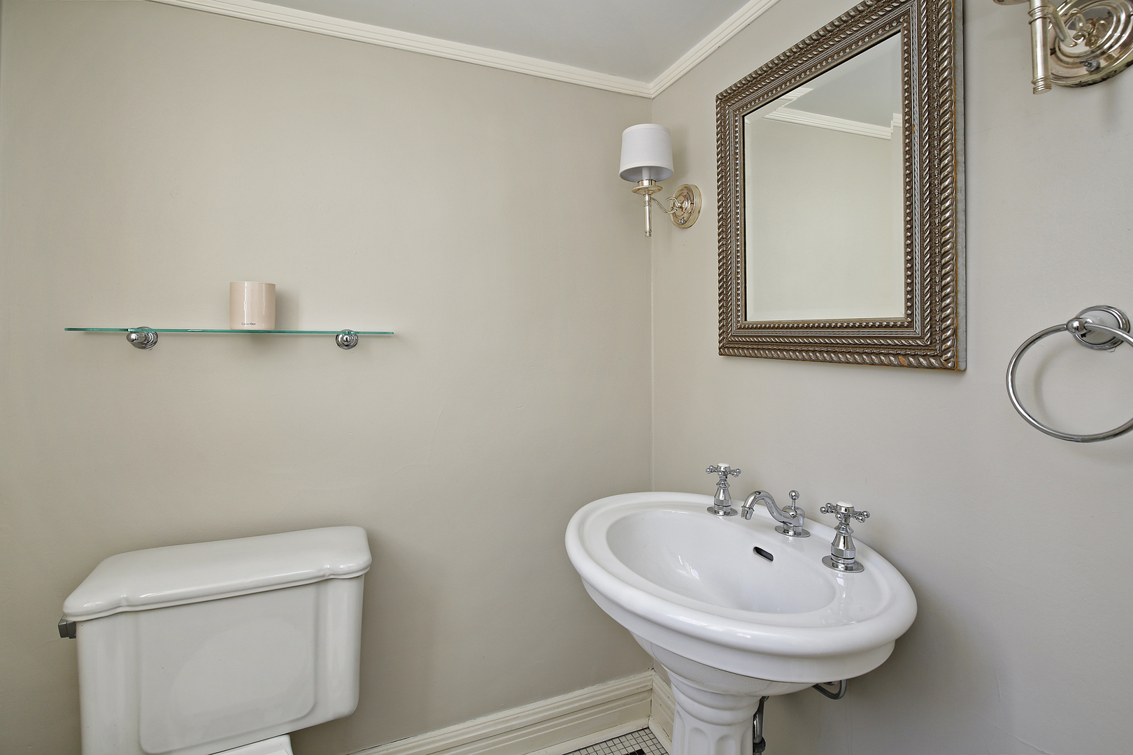 834 Valley Road Glencoe, IL 60022 - Photo 11 of 25 a bathroom with a sink a toilet and a mirror