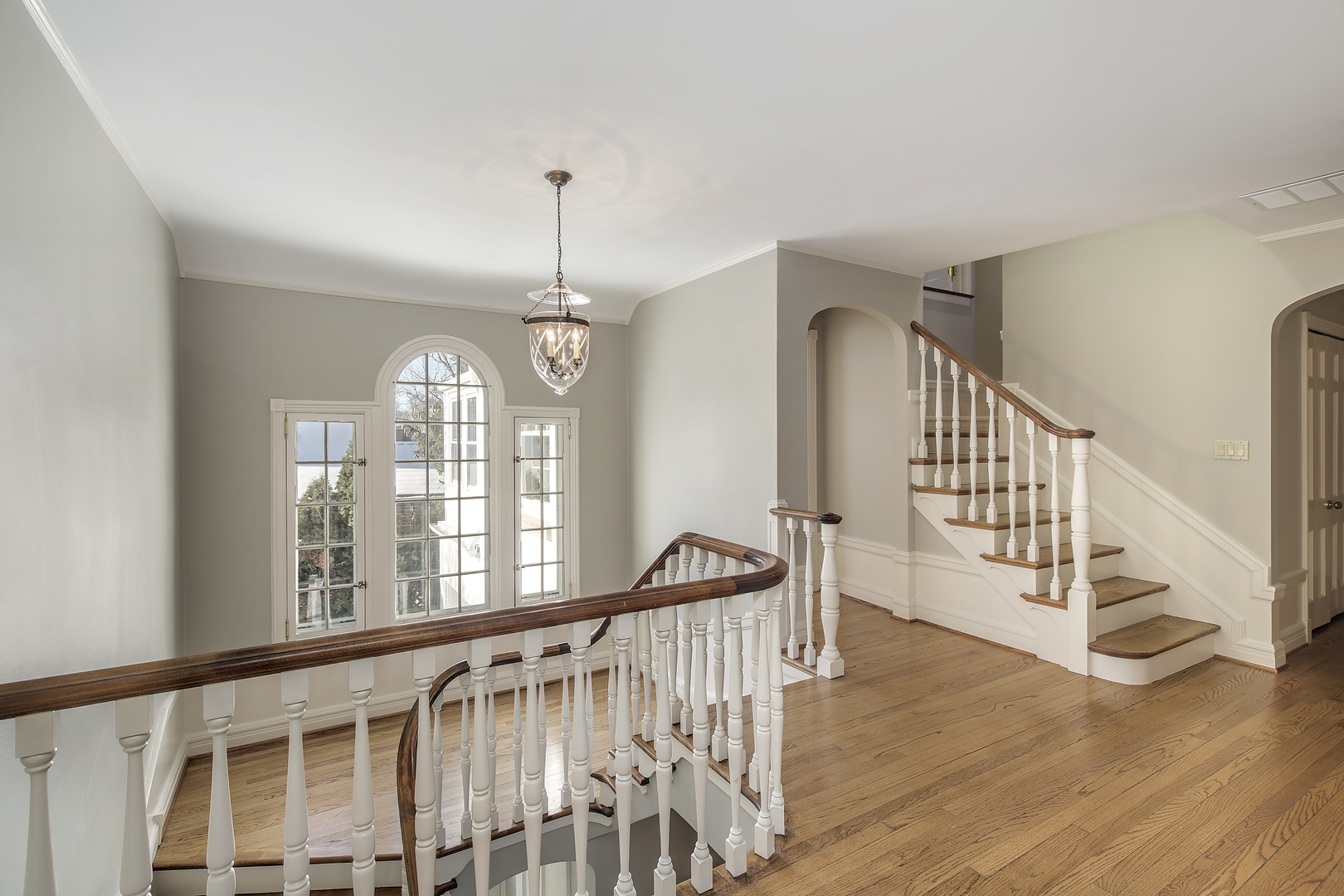 834 Valley Road Glencoe, IL 60022 - Photo 13 of 25 a view of an entryway wooden floor and windows