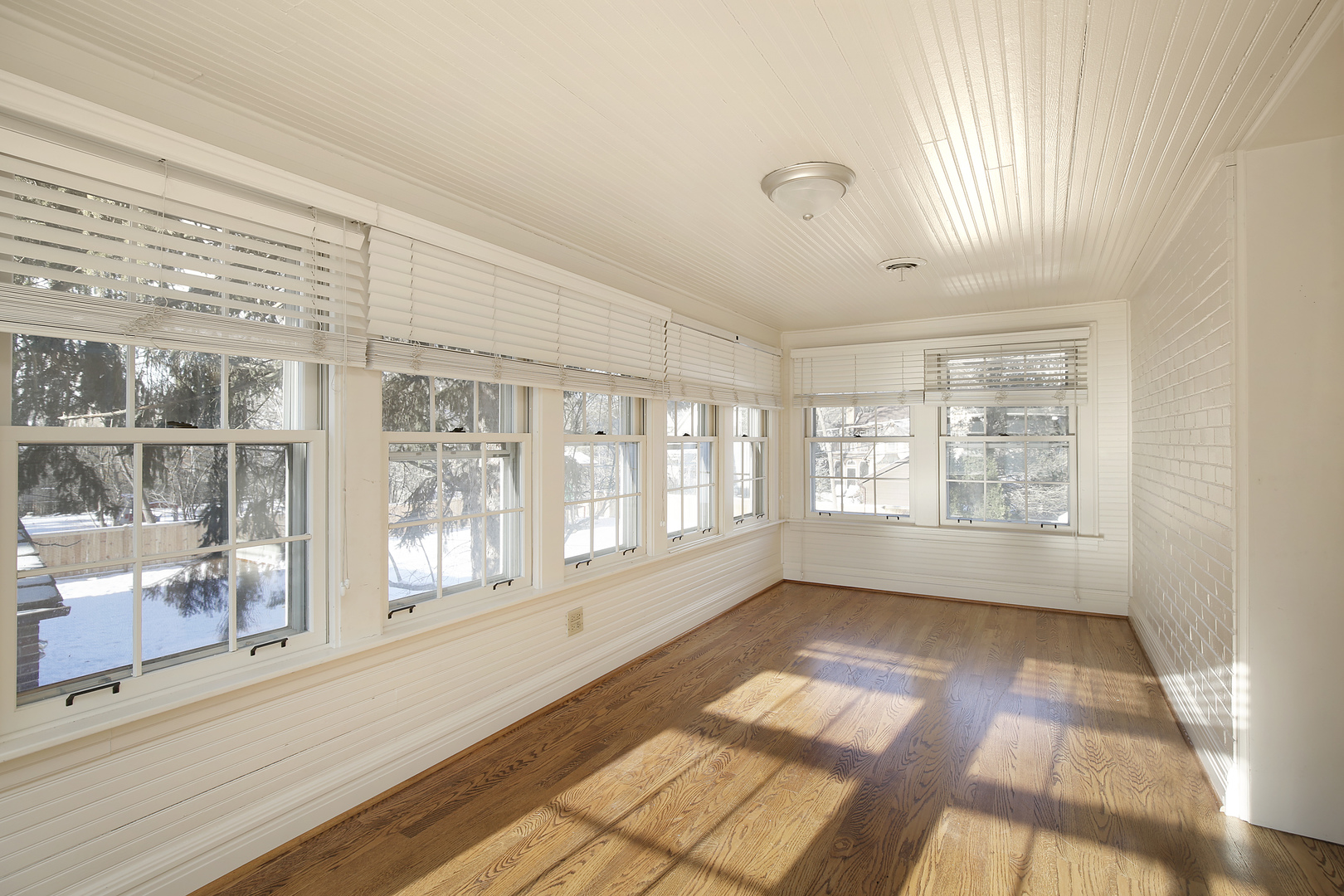 834 Valley Road Glencoe, IL 60022 - Photo 18 of 25 a view of an empty room with a window