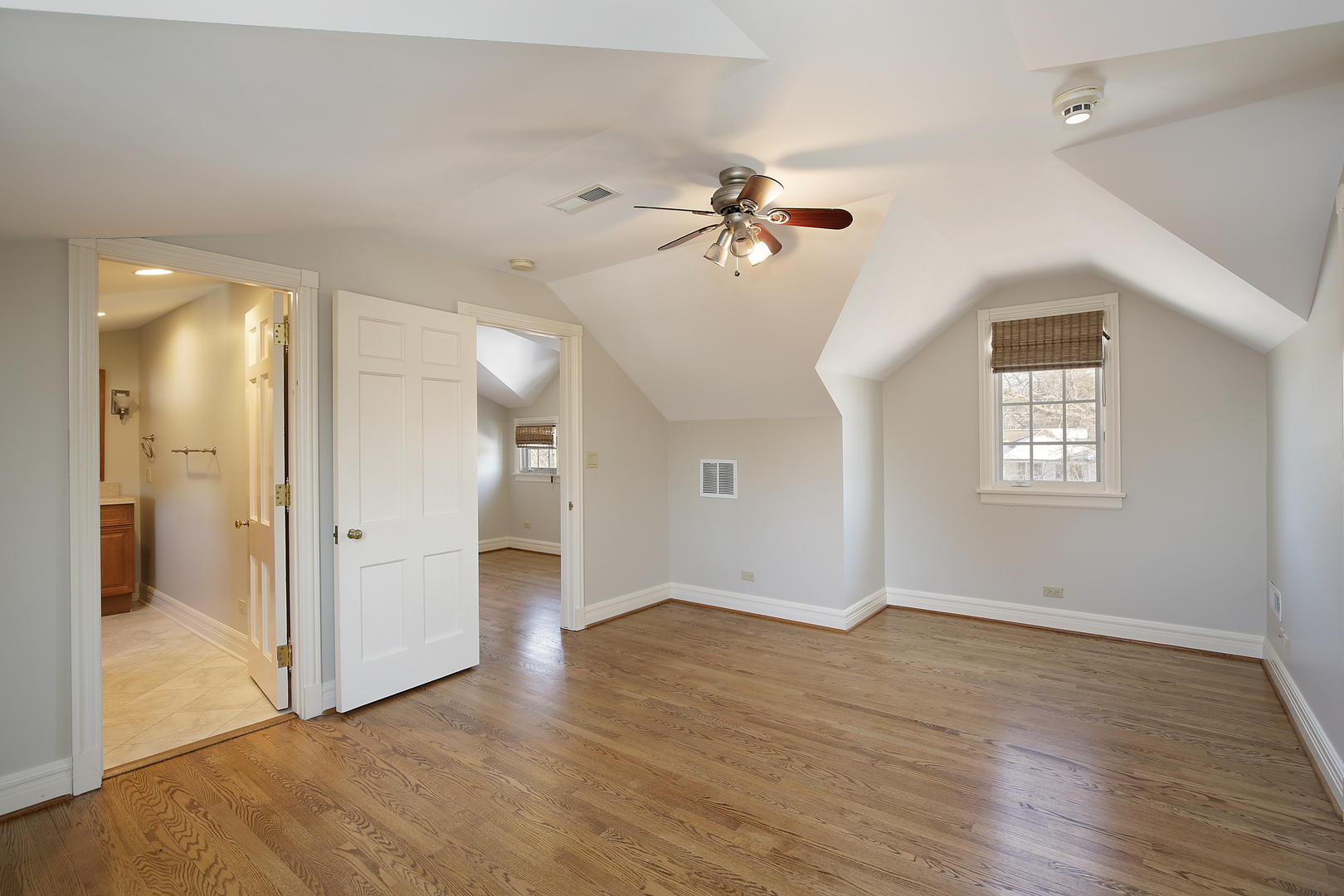 834 Valley Road Glencoe, IL 60022 - Photo 22 of 25 wooden floor in an empty room with a window