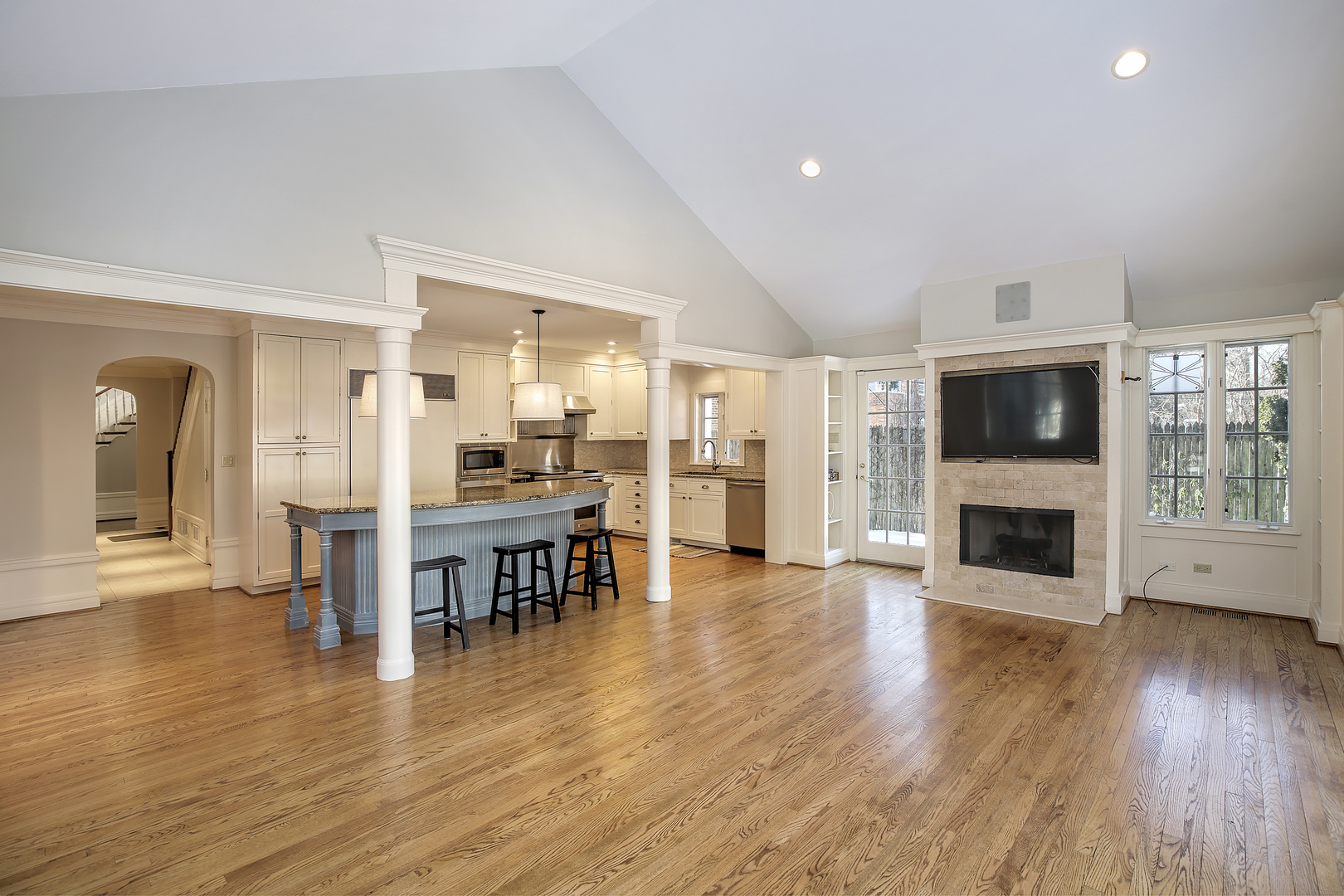 834 Valley Road Glencoe, IL 60022 - Photo 10 of 25 a living room with furniture wooden floor and a fireplace