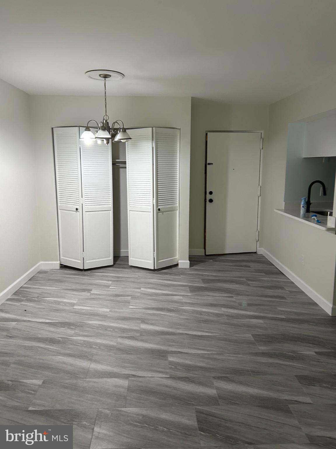 5823 Royal Ridge Drive, Unit D Springfield, VA 22152 - Photo 8 of 12 Spacious entryway with modern finishes.