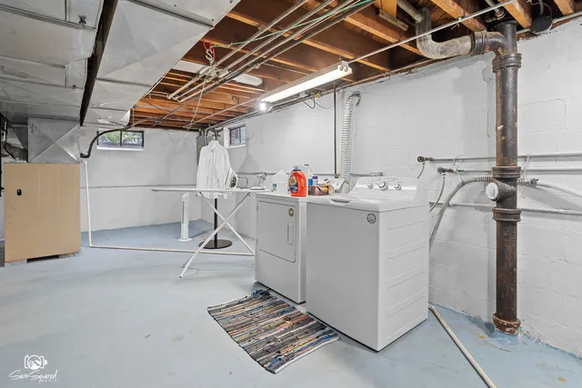 a utility room with dryer and washer