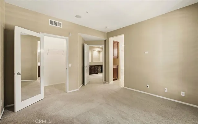 a kitchen with a sink and refrigerator