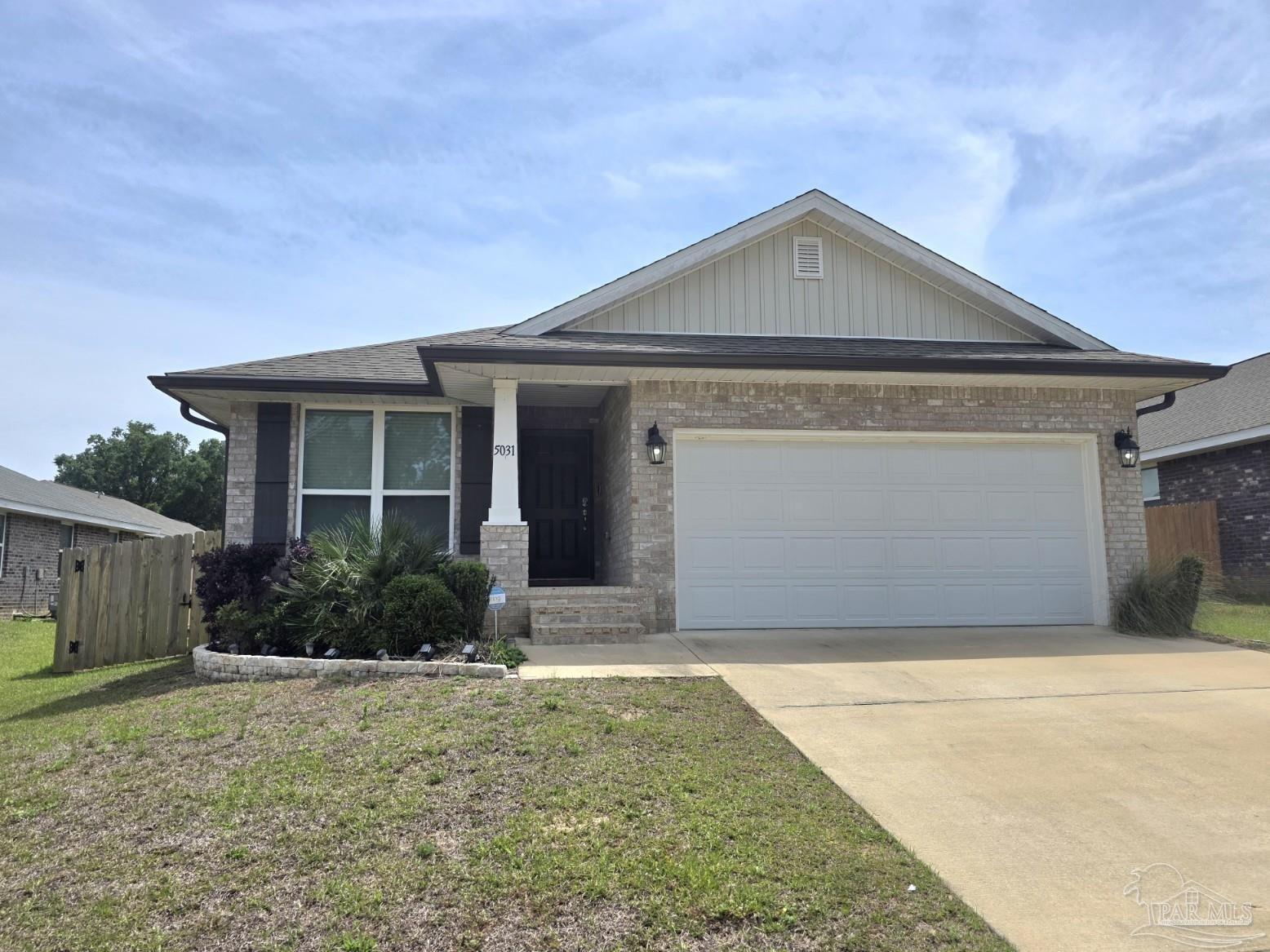 5031 Firstmate Way Pensacola, FL 32526 - Photo 1 of 27 a front view of a house with garden