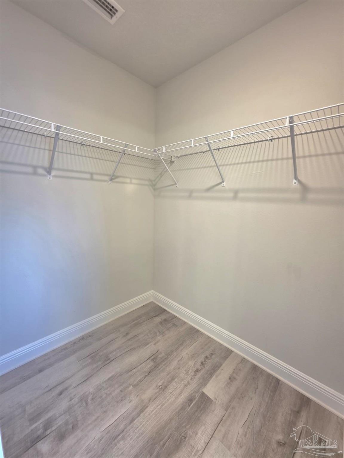 5031 Firstmate Way Pensacola, FL 32526 - Photo 15 of 27 a view of a room with racks on the wall