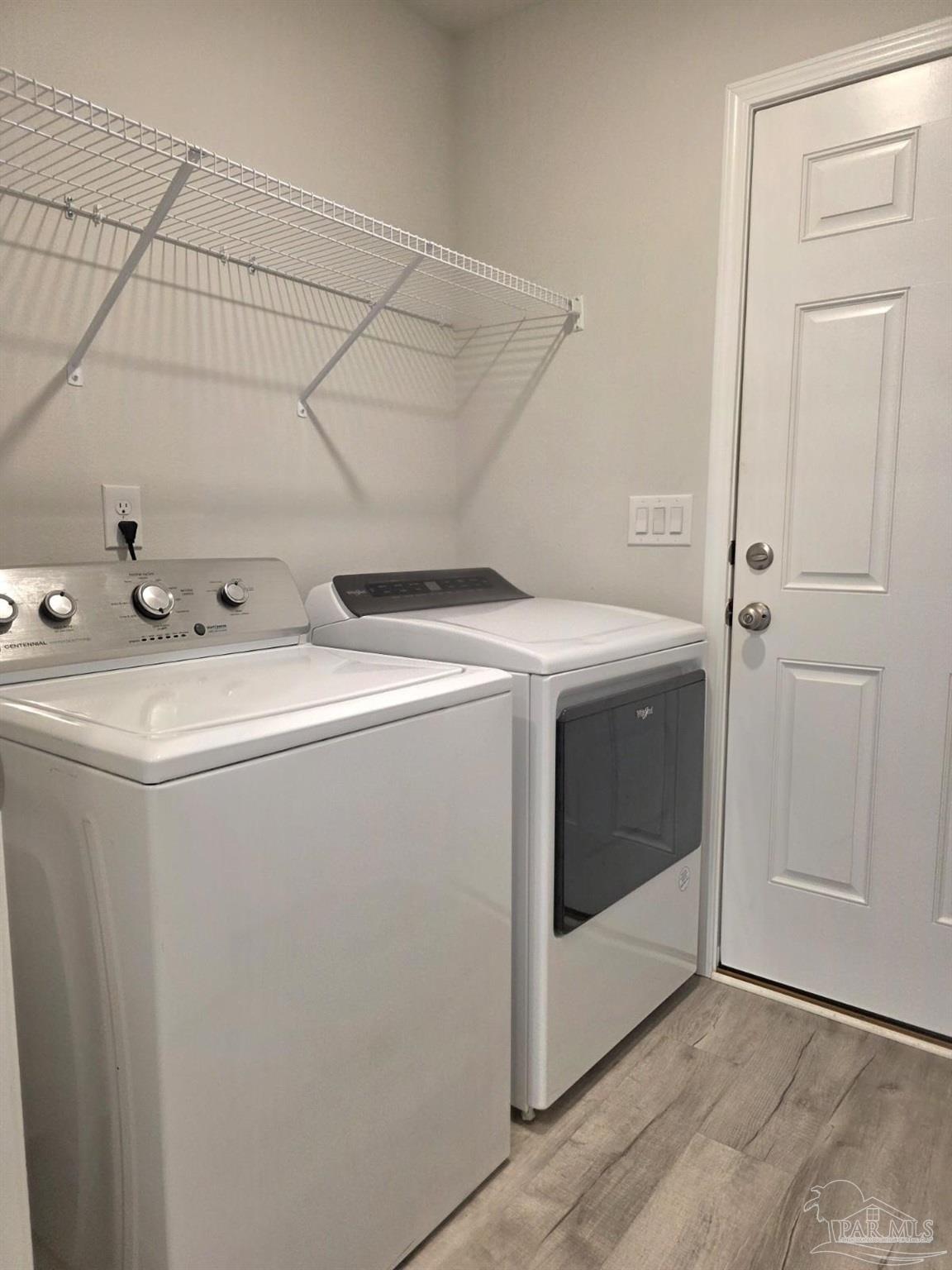 5031 Firstmate Way Pensacola, FL 32526 - Photo 22 of 27 a utility room with dryer and washer