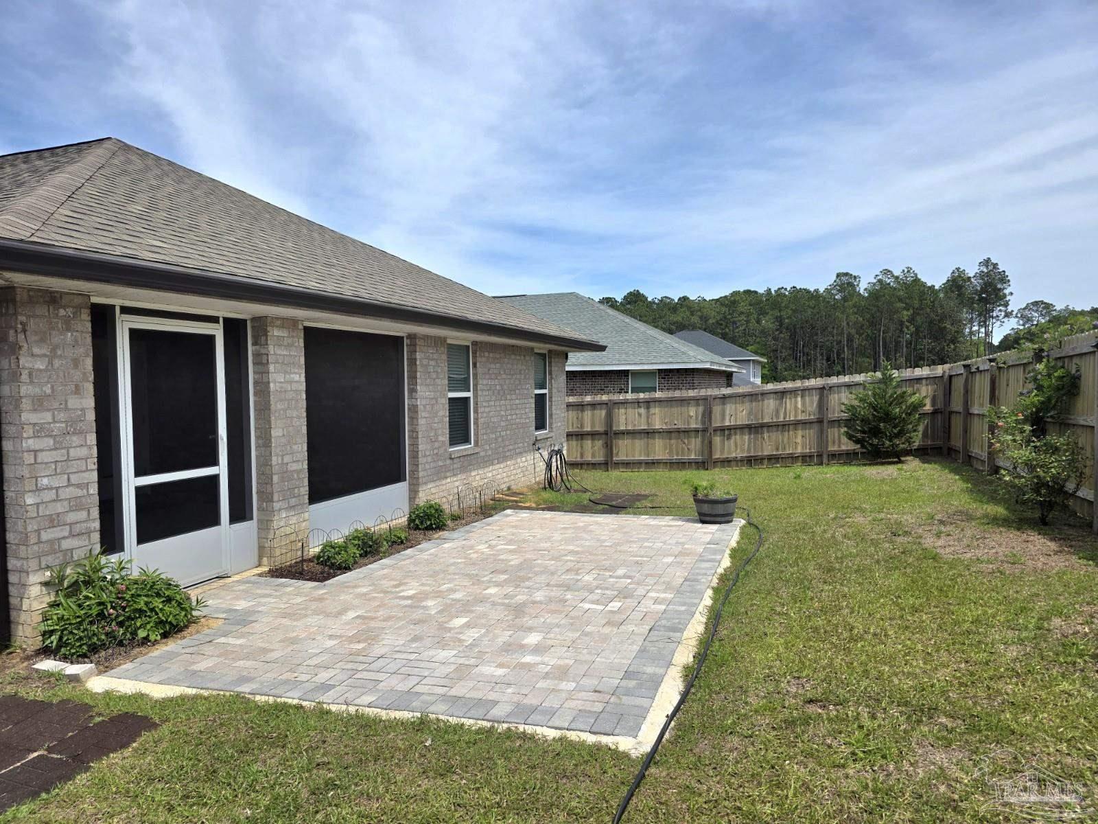 5031 Firstmate Way Pensacola, FL 32526 - Photo 26 of 27 a front view of house with yard