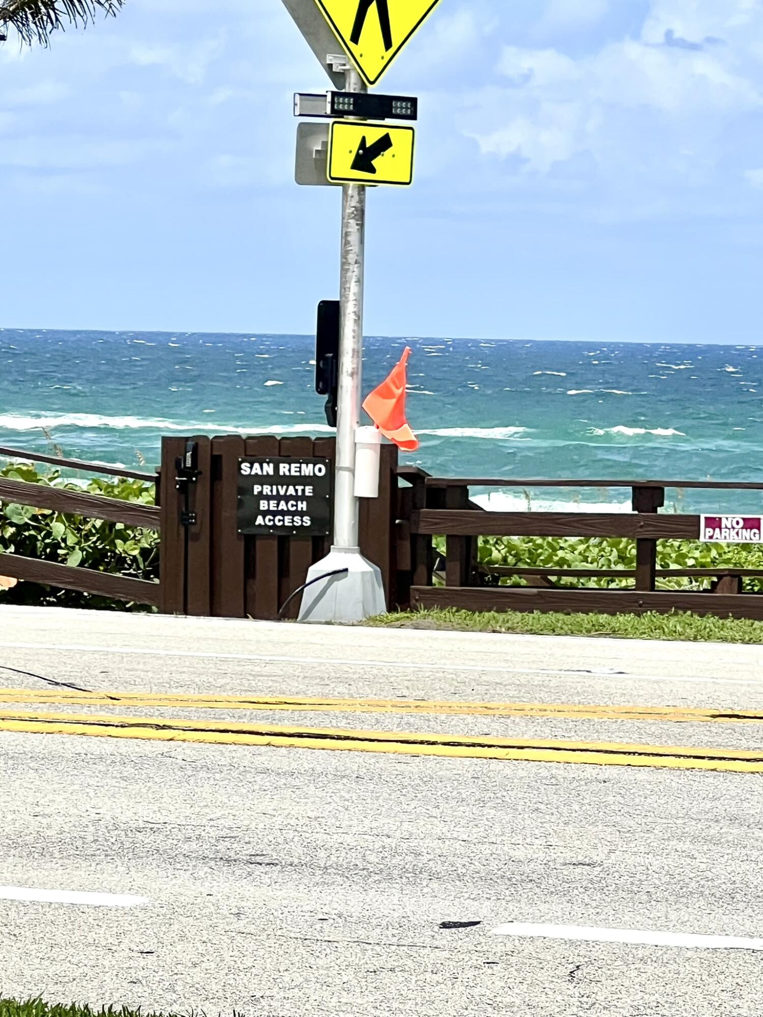 a view of swimming pool with an ocean view