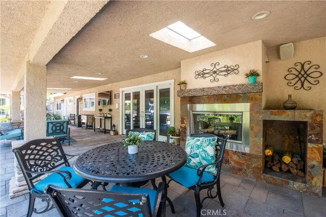 a view of a park with plants and large trees