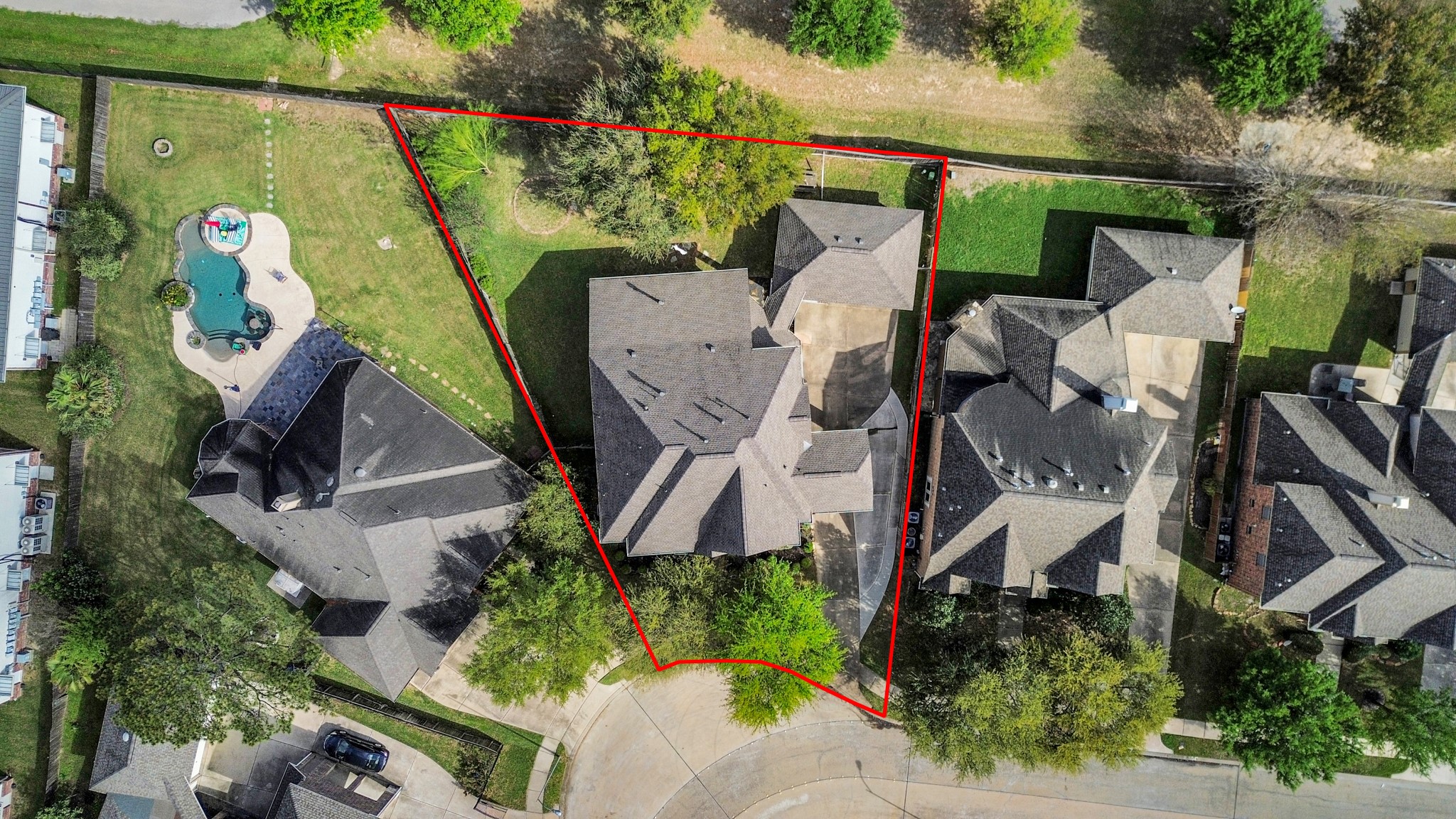 17618 Raven Canyon Lane Houston, TX 77095 - Photo 42 of 45 A top-down view of the property with its outlined lot boundary, highlighting the spacious yard and layout.