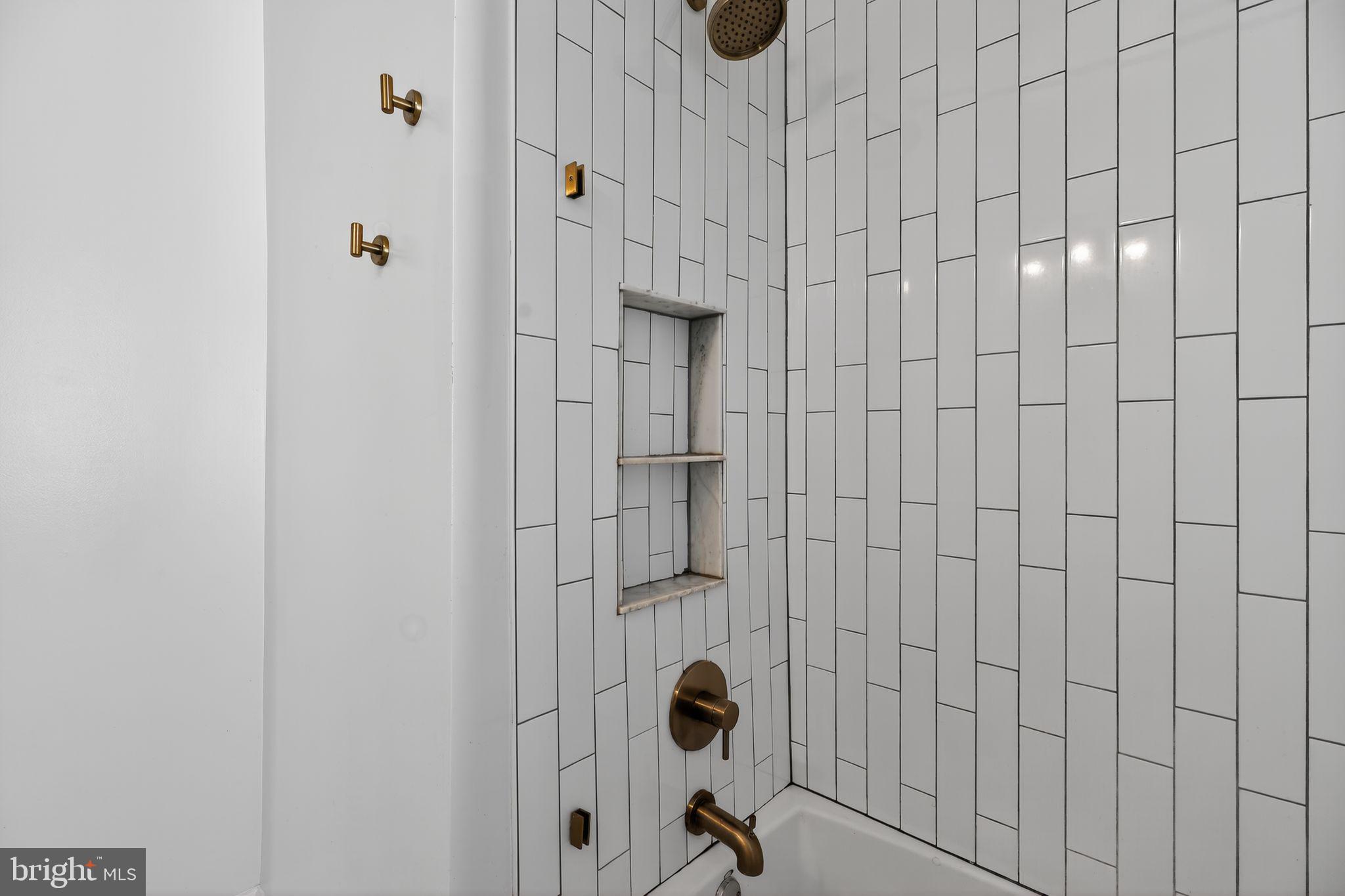 3947 S Street Southeast Washington, DC 20020 - Photo 22 of 28 a bathroom with a shower