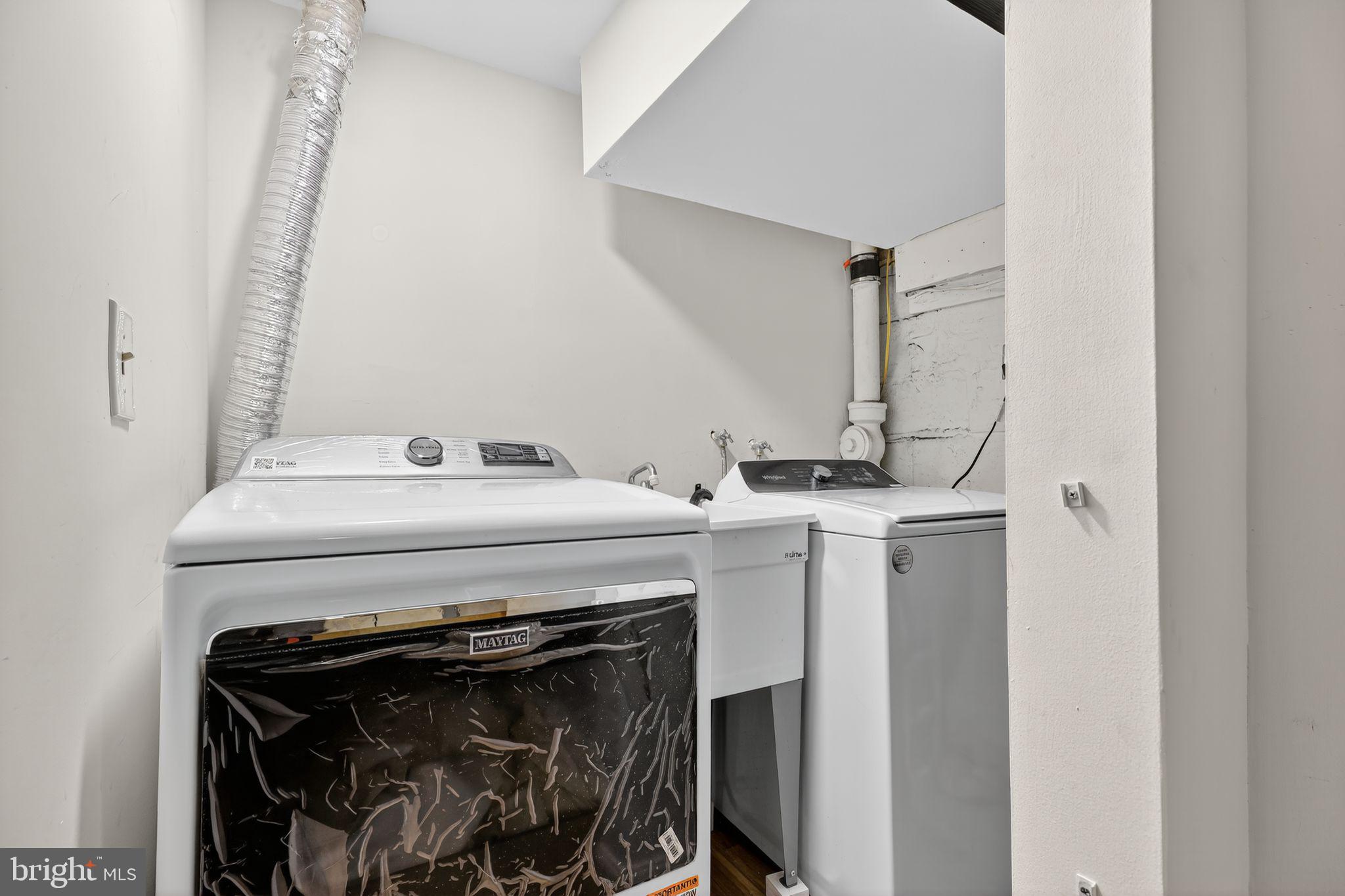 3947 S Street Southeast Washington, DC 20020 - Photo 26 of 28 a utility room with dryer and washer