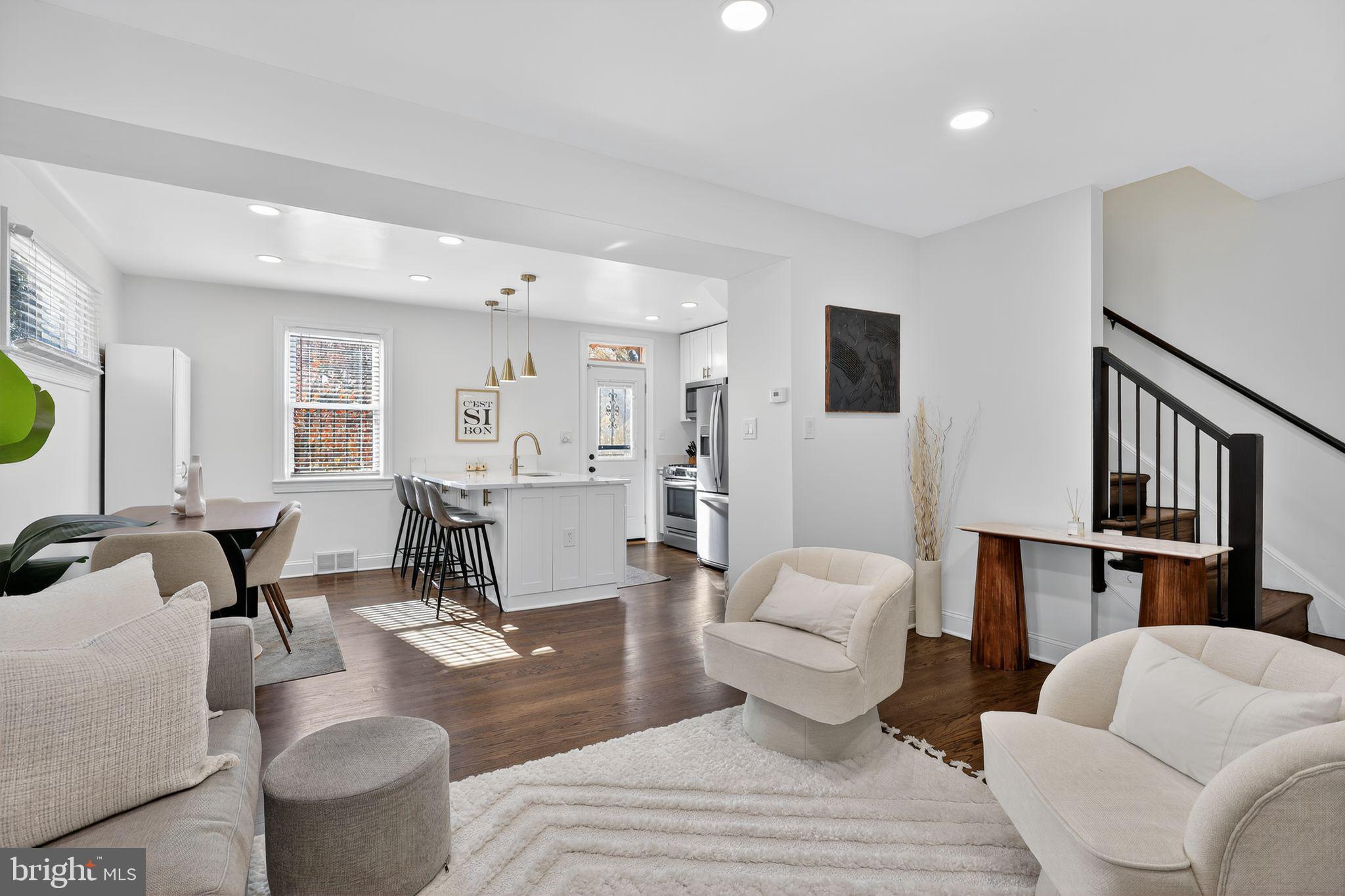 3947 S Street Southeast Washington, DC 20020 - Photo 5 of 28 a living room with furniture and wooden floor