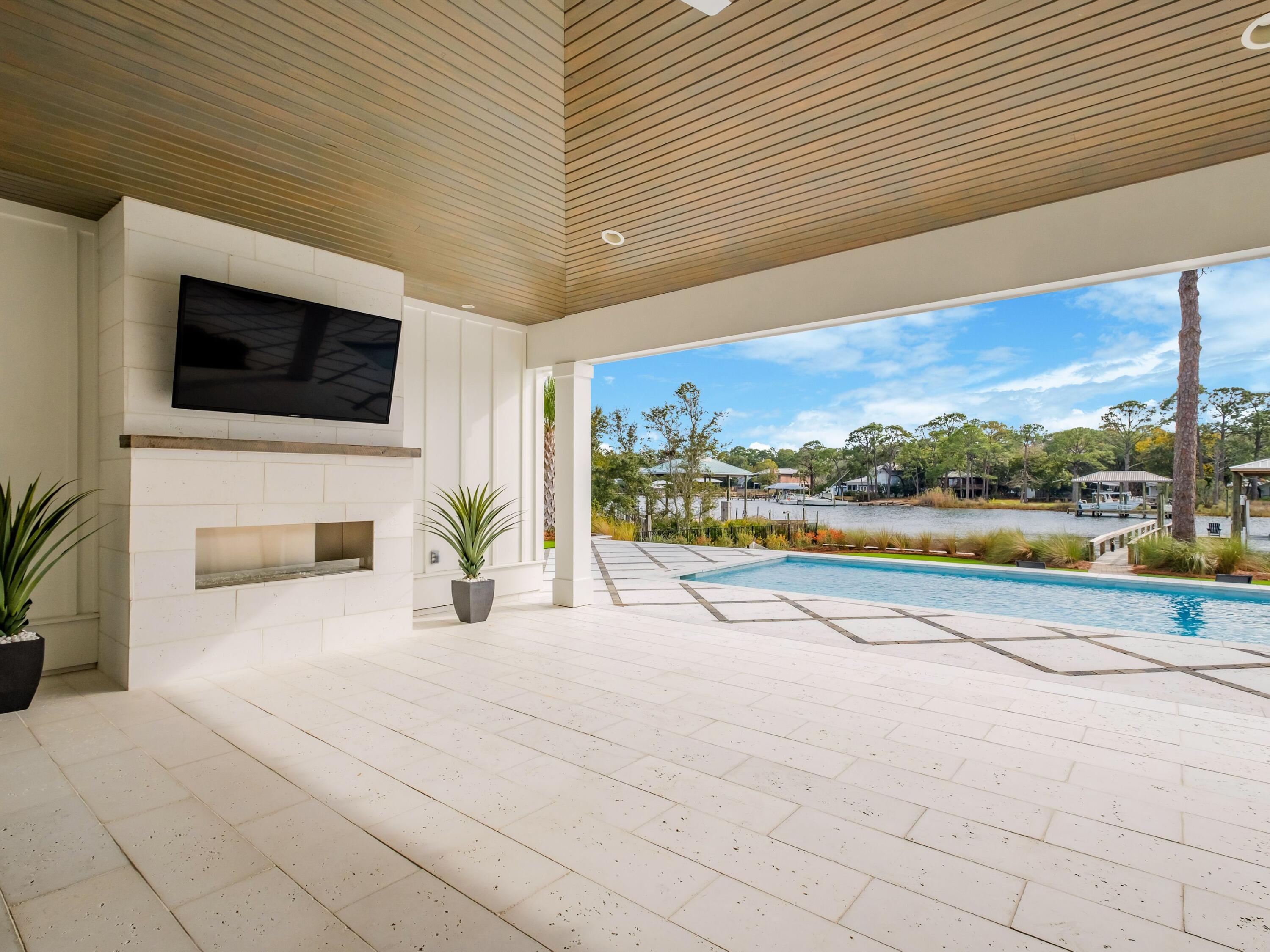 336 East Shipwreck Road Santa Rosa Beach, FL 32459 - Photo 13 of 54 a view of a living room and a flat screen tv