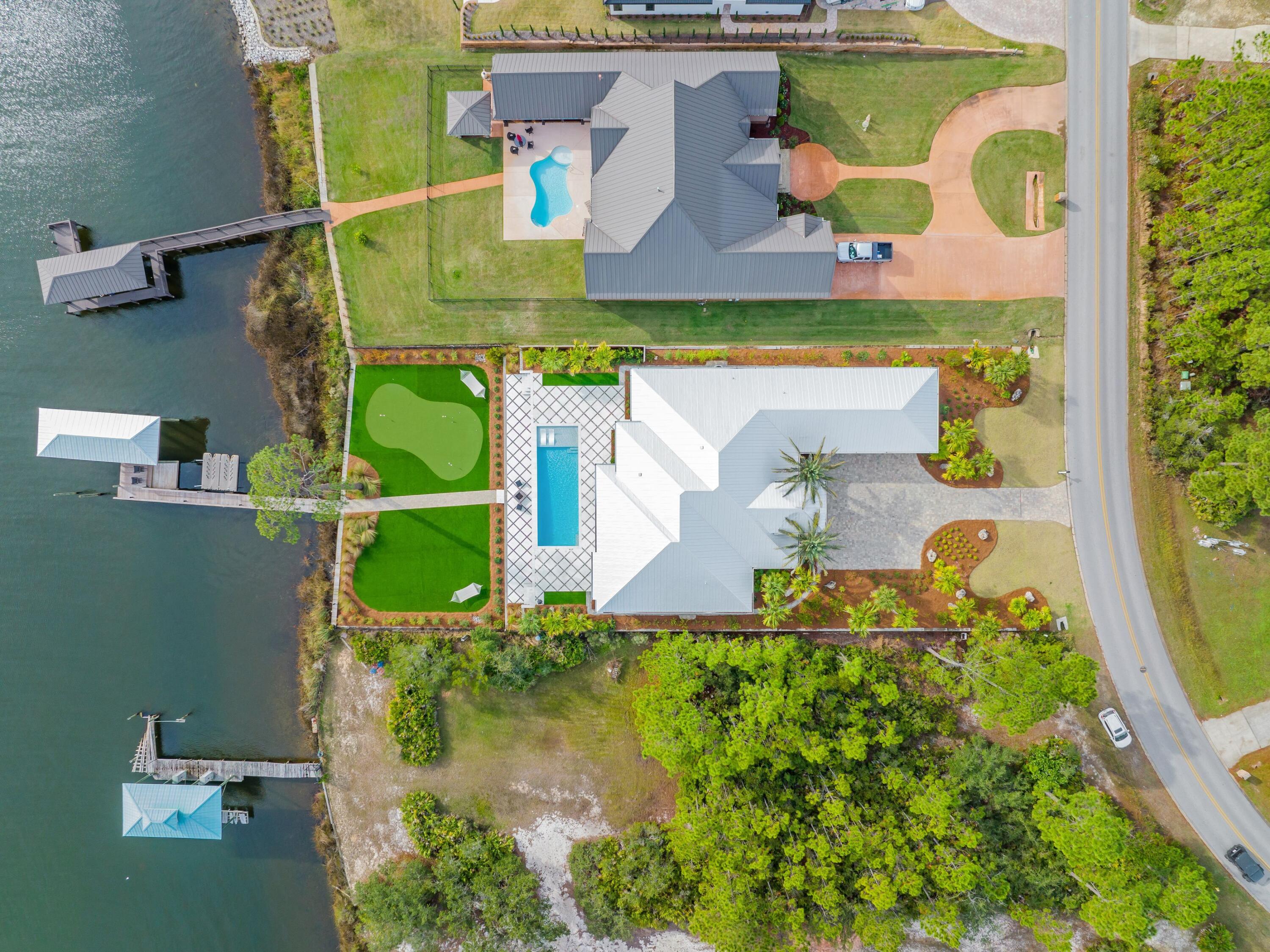 336 East Shipwreck Road Santa Rosa Beach, FL 32459 - Photo 2 of 54 an aerial view of a house with a swimming pool