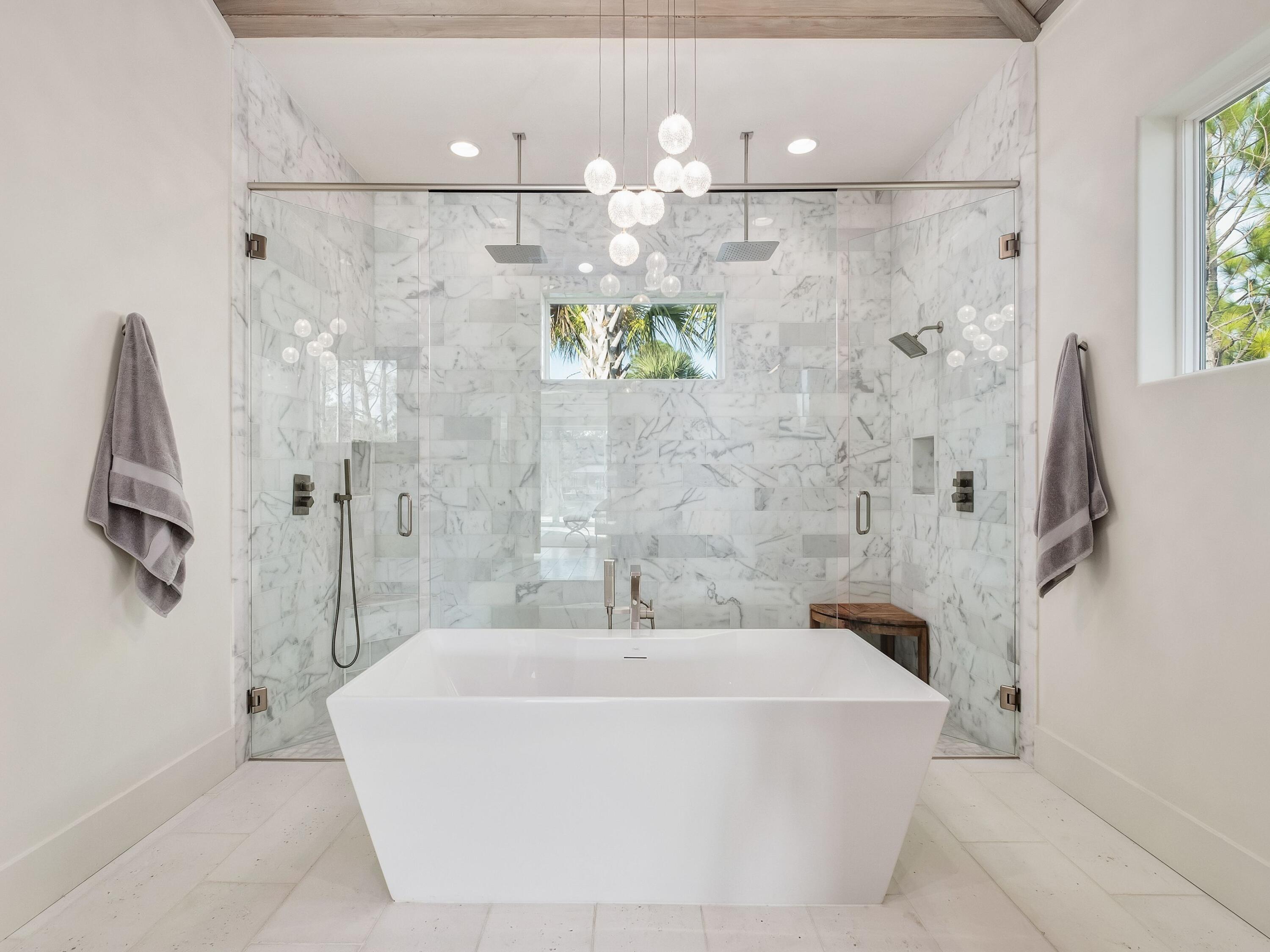 336 East Shipwreck Road Santa Rosa Beach, FL 32459 - Photo 27 of 54 a white bath tub sitting next to a shower