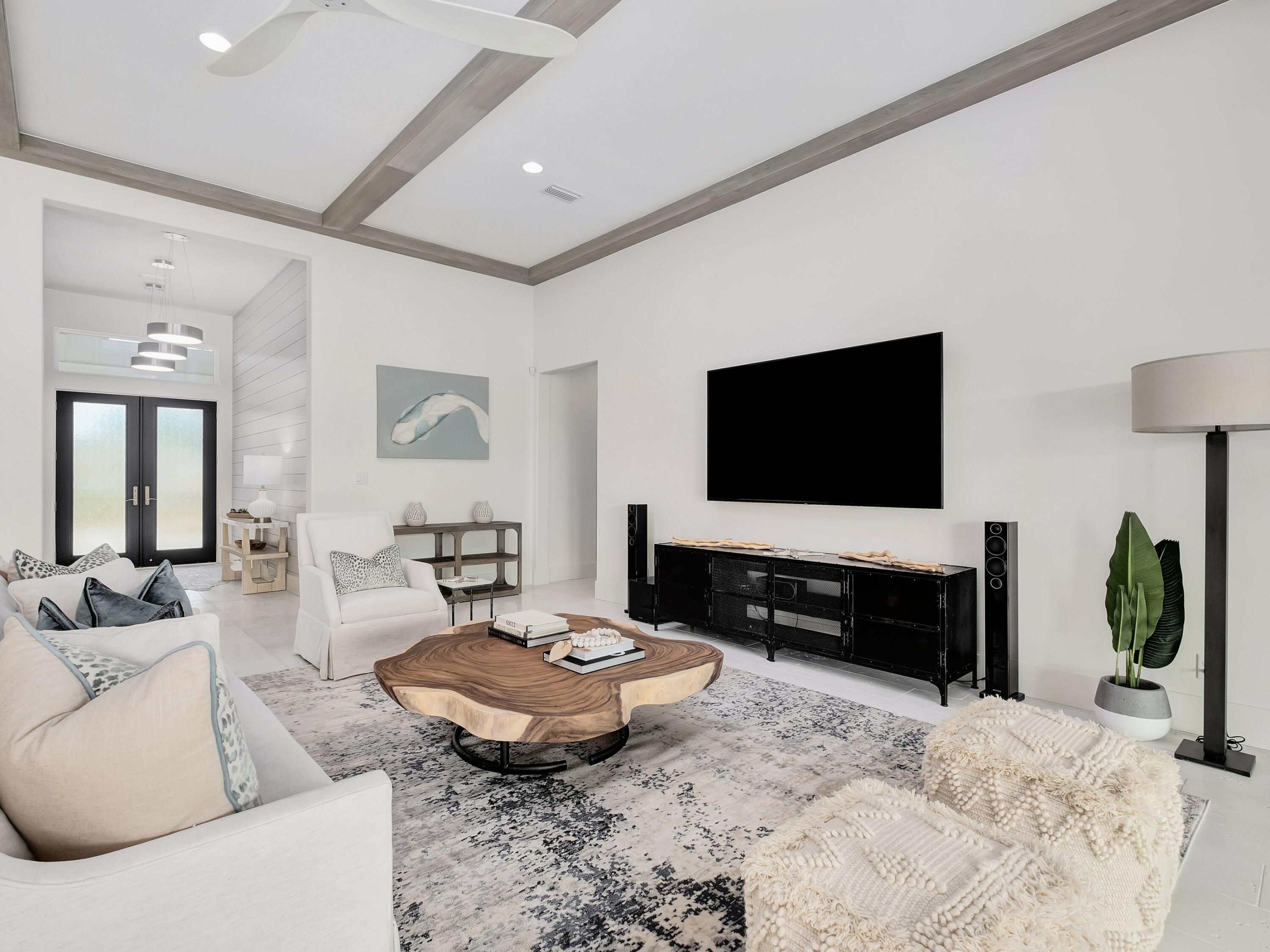 336 East Shipwreck Road Santa Rosa Beach, FL 32459 - Photo 30 of 54 a living room with furniture and a flat screen tv