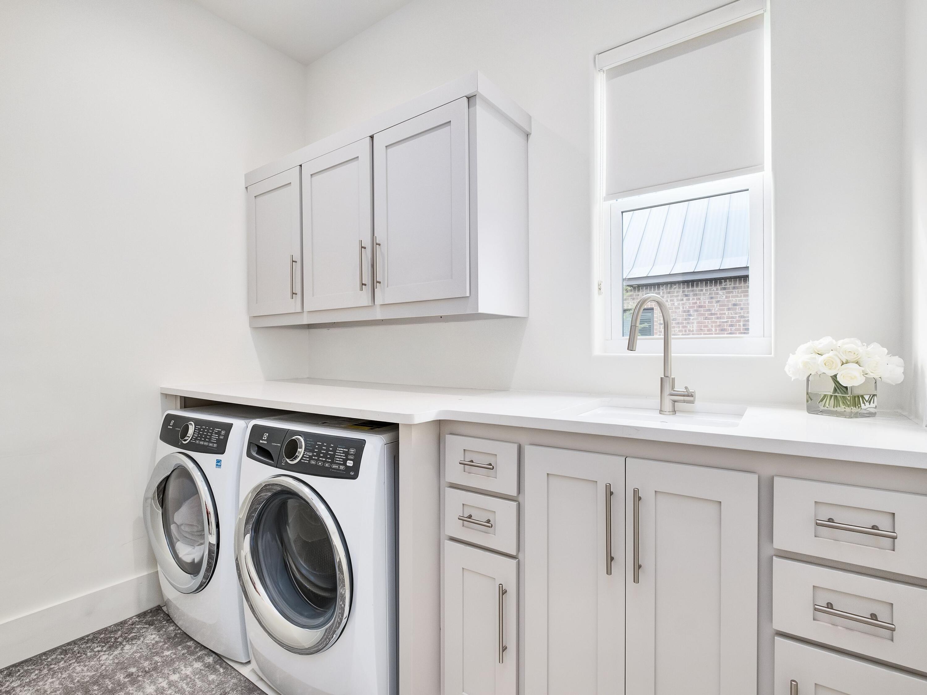 336 East Shipwreck Road Santa Rosa Beach, FL 32459 - Photo 37 of 54 a utility room with sink dryer and washer