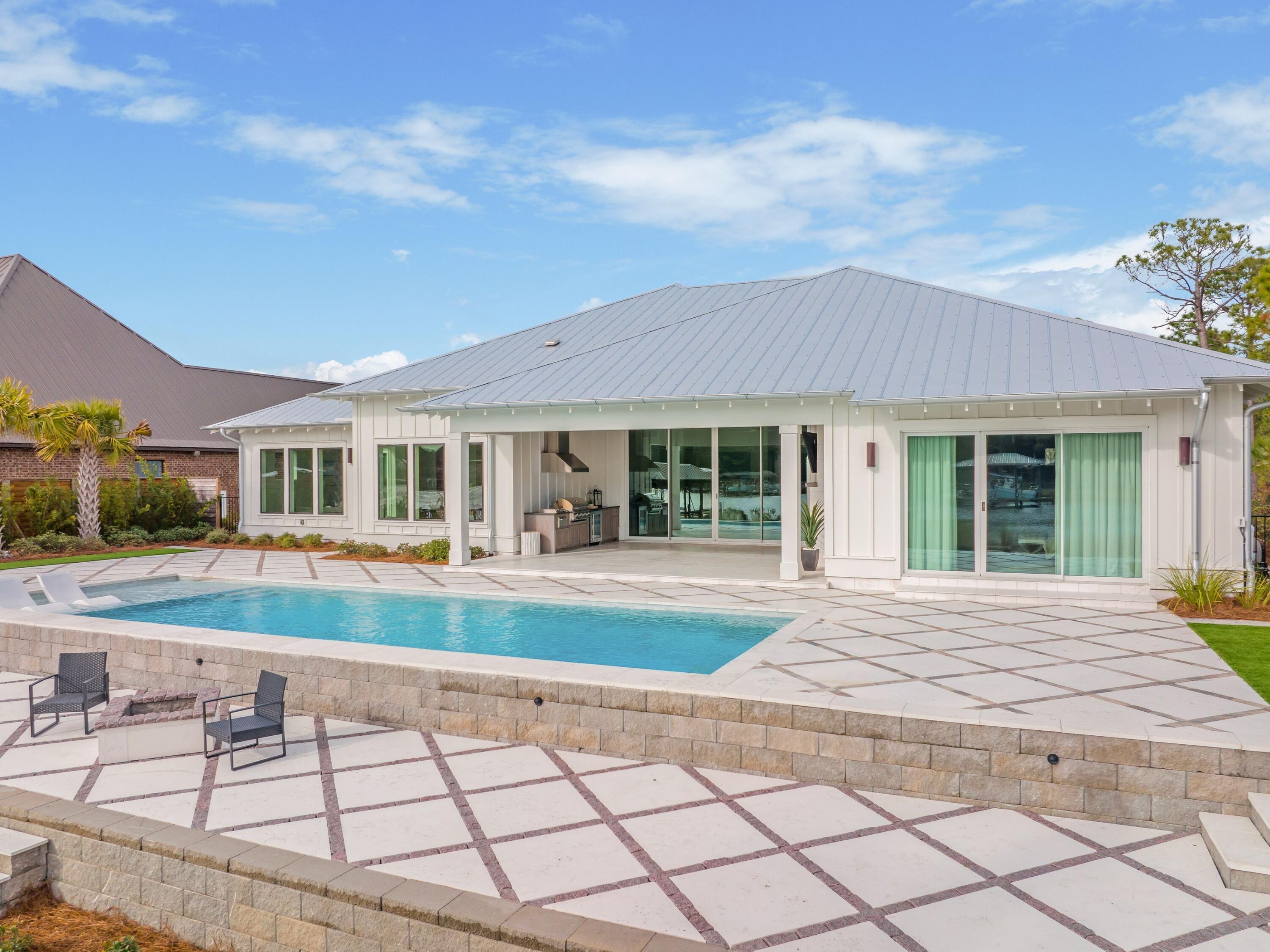 336 East Shipwreck Road Santa Rosa Beach, FL 32459 - Photo 46 of 54 front view of a house with a yard