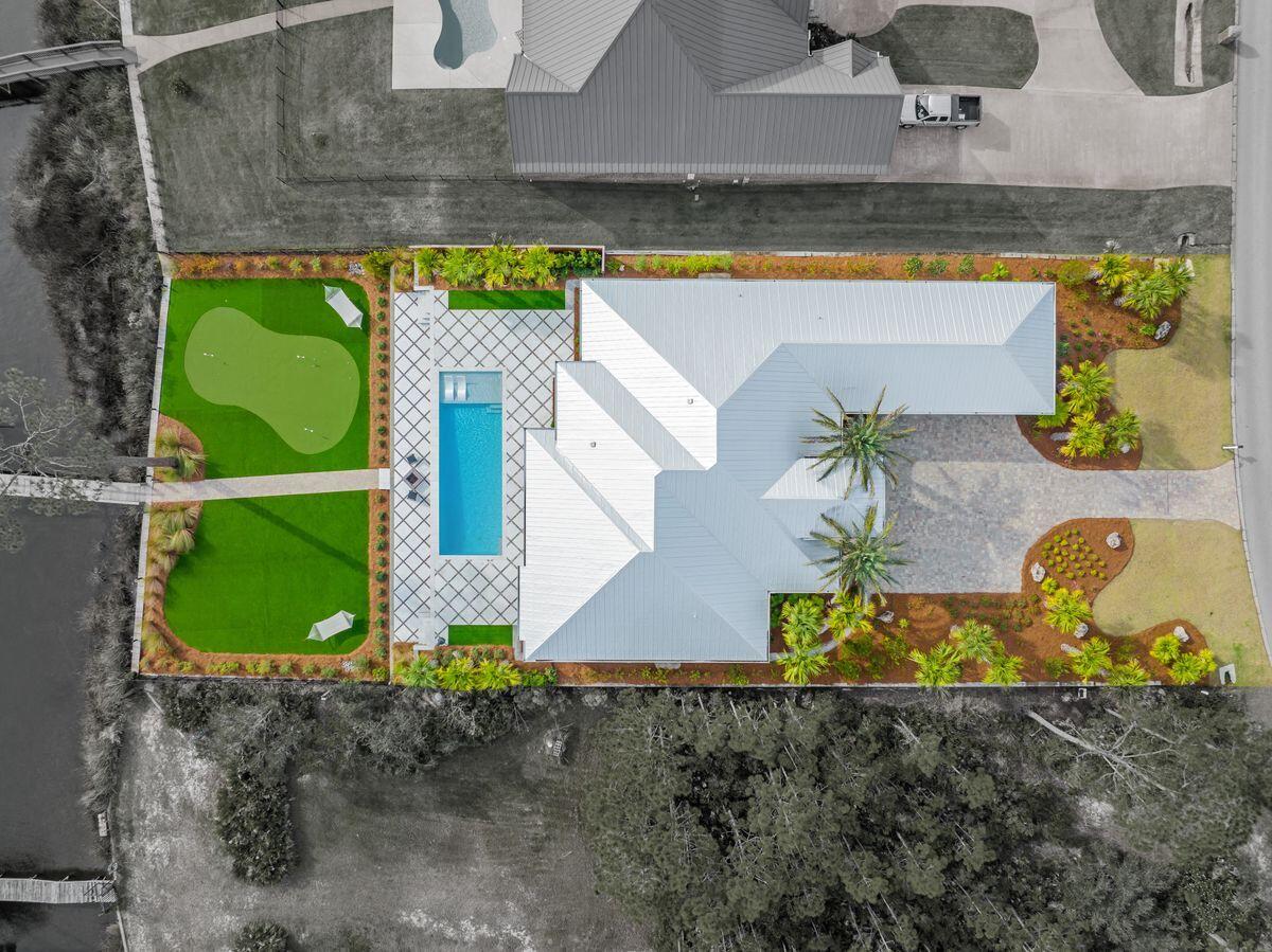 336 East Shipwreck Road Santa Rosa Beach, FL 32459 - Photo 50 of 54 a view of swimming pool with a yard and sitting area