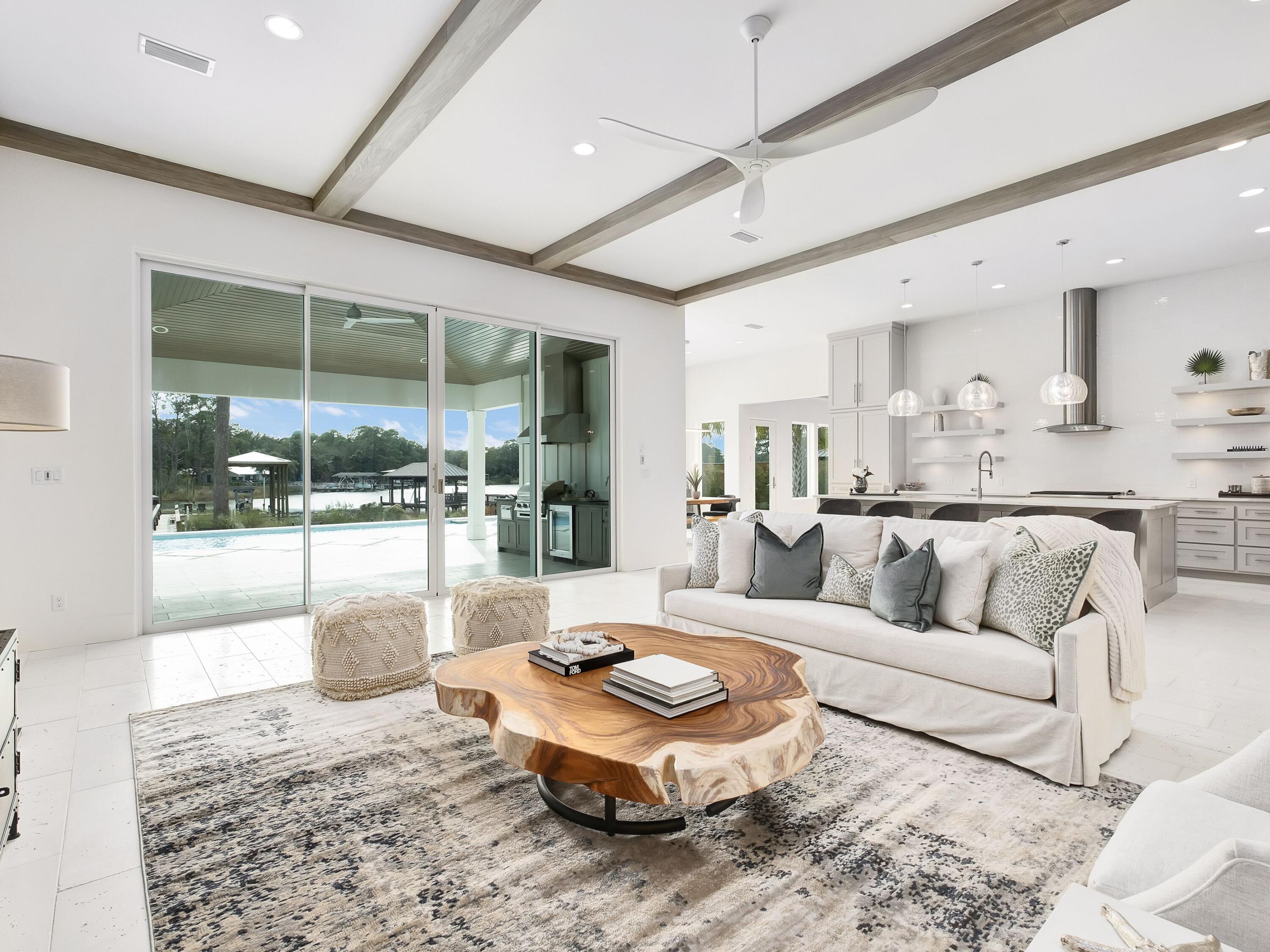 336 East Shipwreck Road Santa Rosa Beach, FL 32459 - Photo 5 of 54 a living room with furniture and a large window