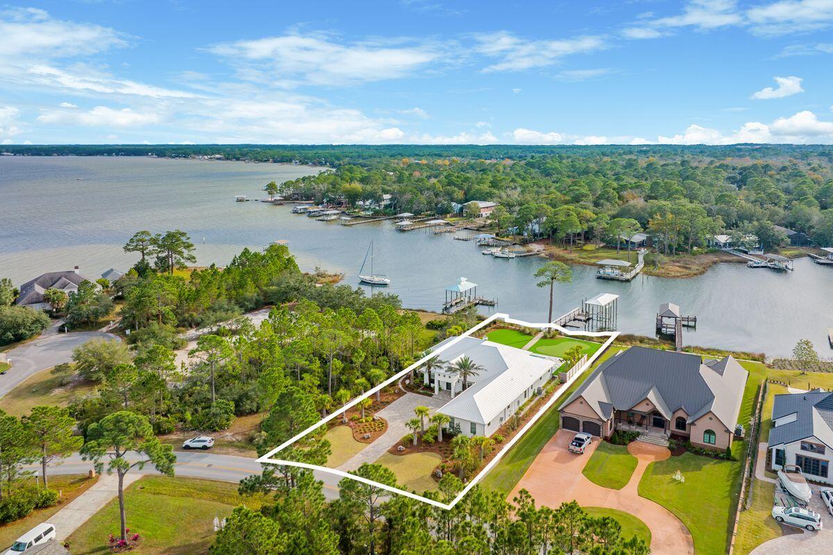 336 East Shipwreck Road Santa Rosa Beach, FL 32459 - Photo 53 of 54 a view of a lake with a house