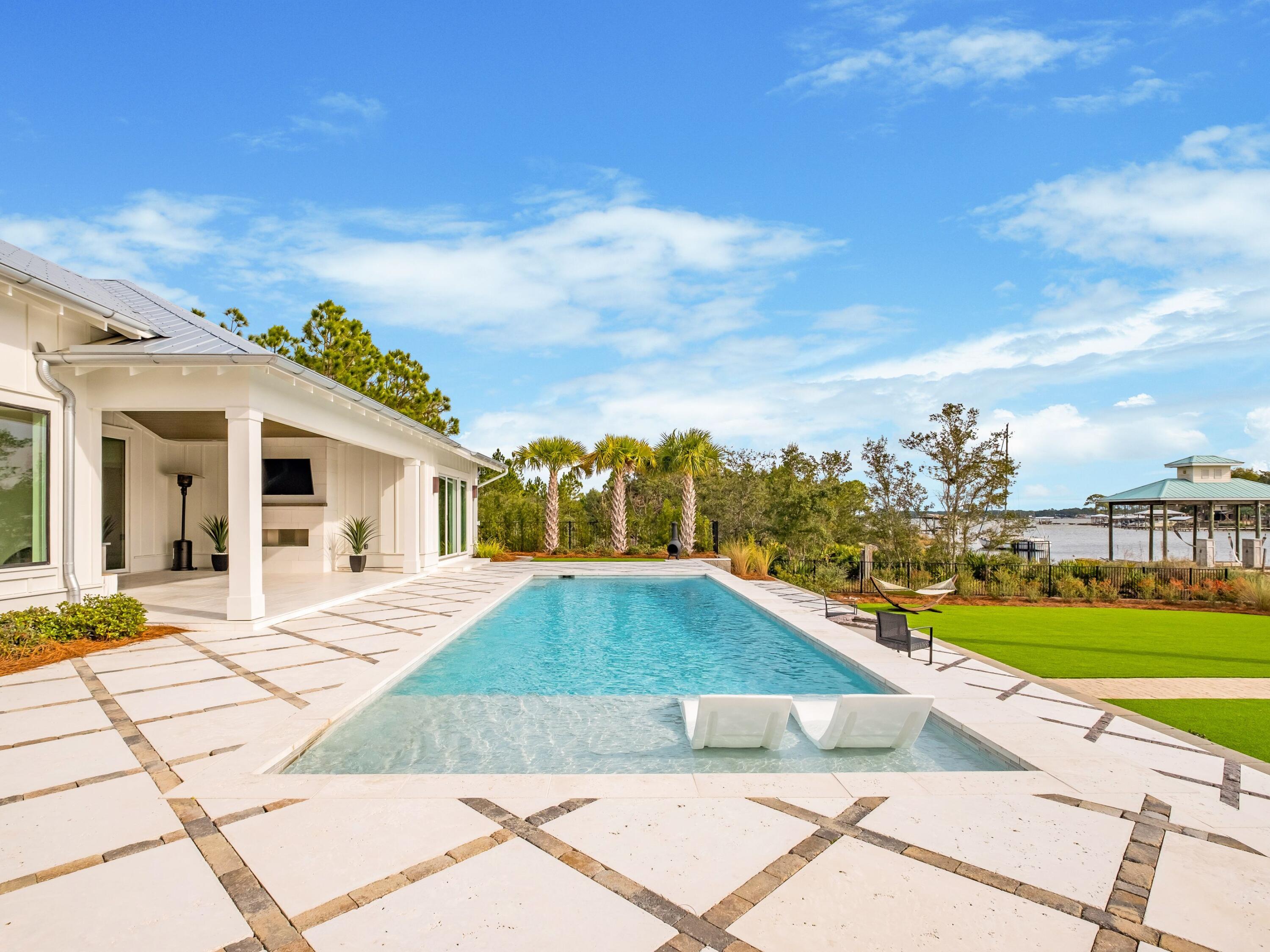 336 East Shipwreck Road Santa Rosa Beach, FL 32459 - Photo 6 of 54 a view of a house with a yard