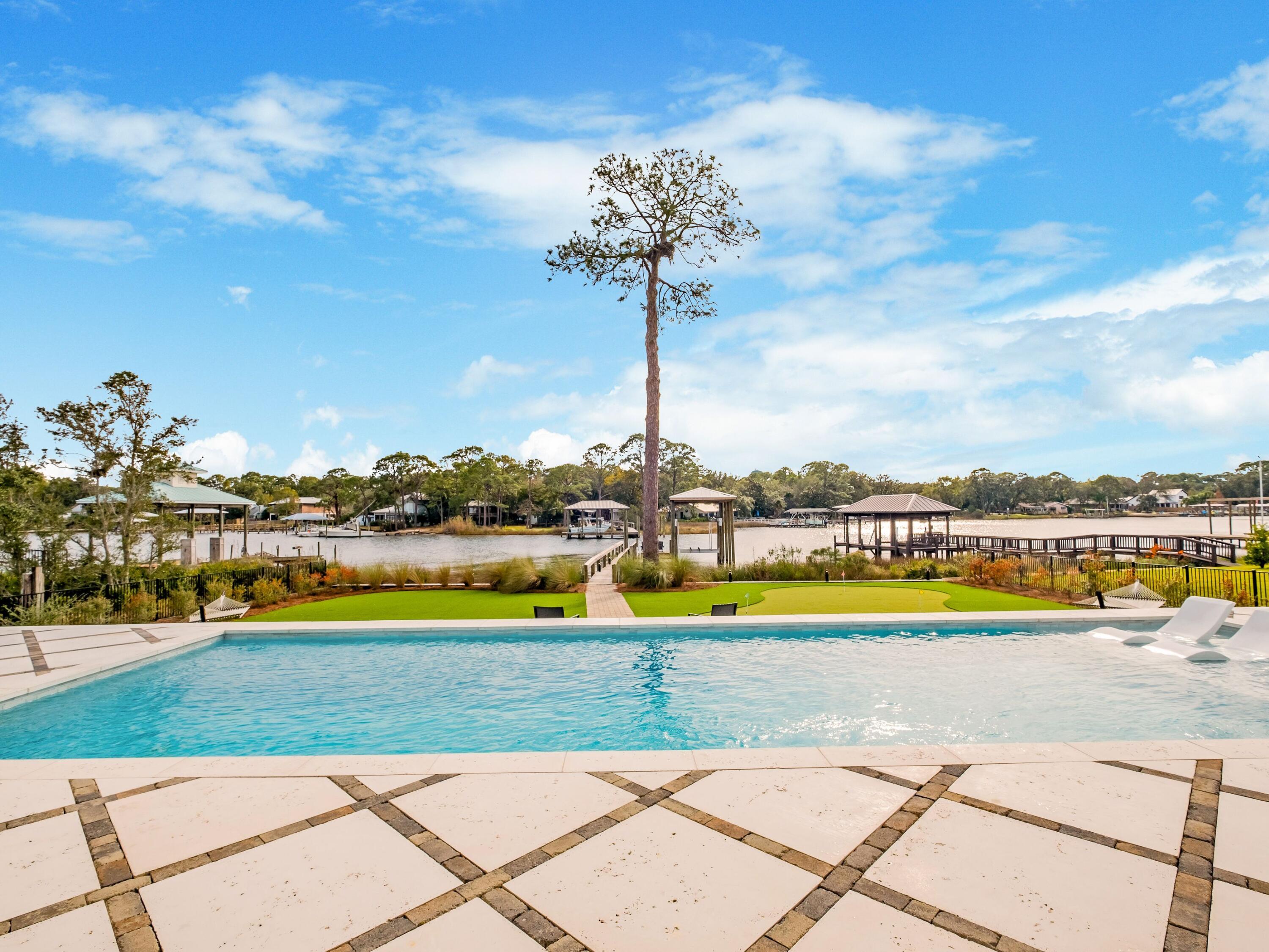 336 East Shipwreck Road Santa Rosa Beach, FL 32459 - Photo 7 of 54 a view of swimming pool and lake view