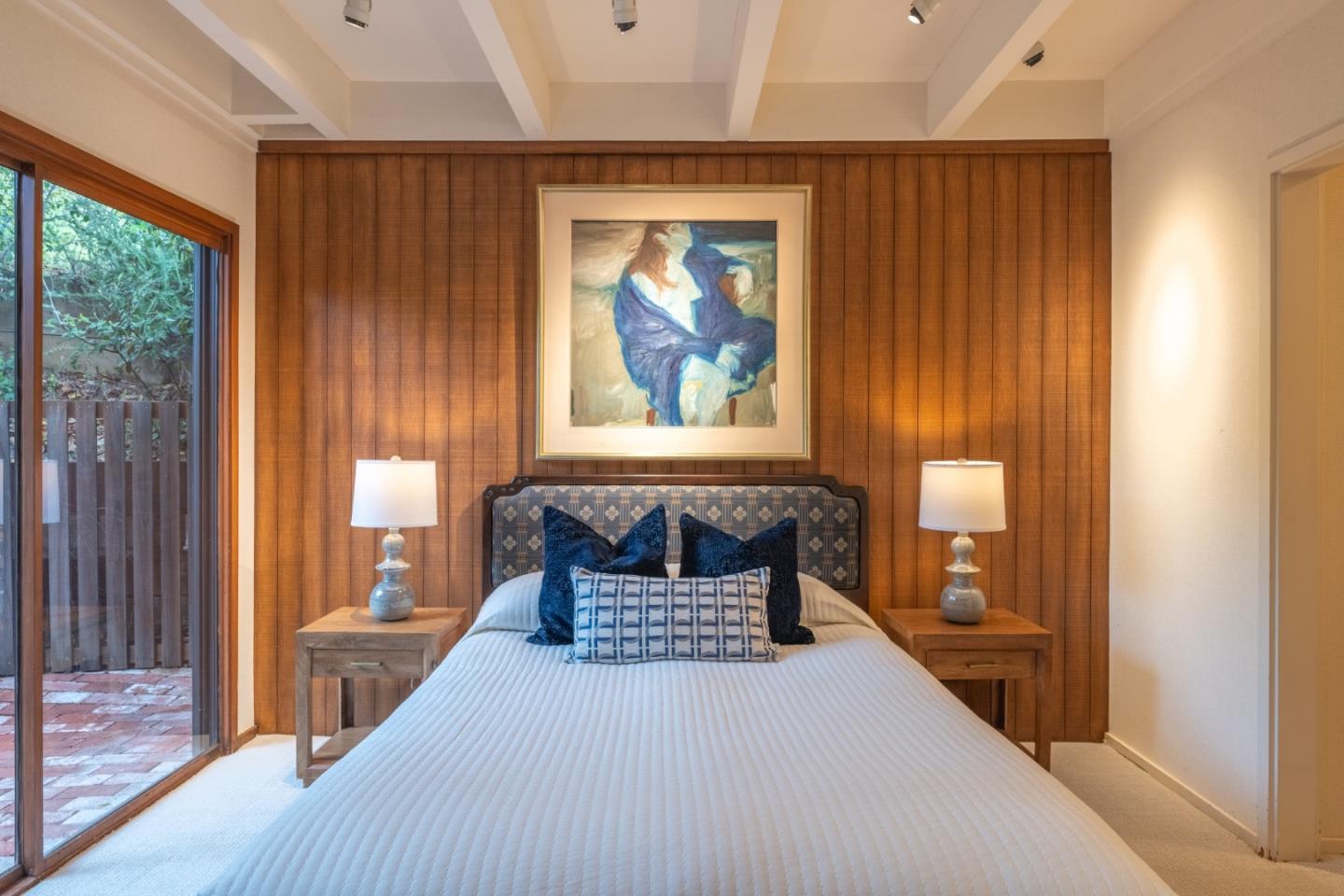 46 Middle Canyon Road Carmel Valley, CA 93924 - Photo 35 of 74 a bedroom with a large bed and a window