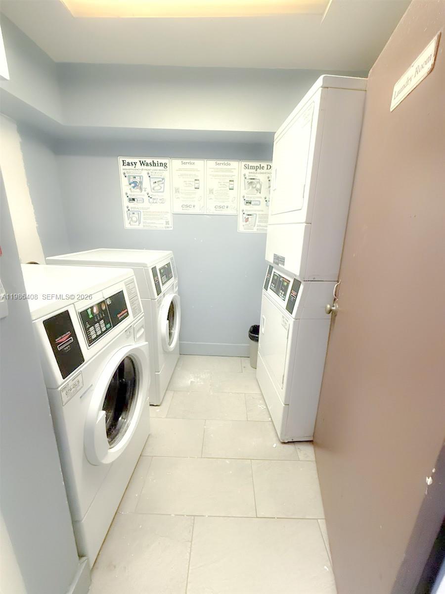 484 Northwest 165th St Road, Unit A412 Miami, FL 33169 - Photo 19 of 22 a view of kitchen and a microwave