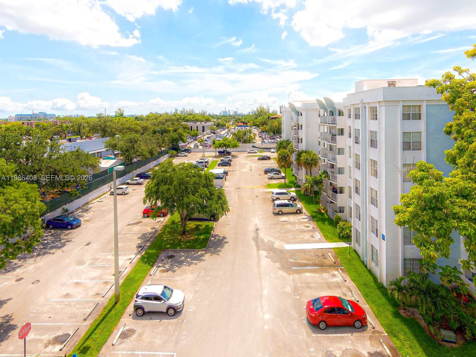 484 Northwest 165th St Road, Unit A412 Miami, FL 33169 - Photo 4 of 22 a view of a city with tall buildings