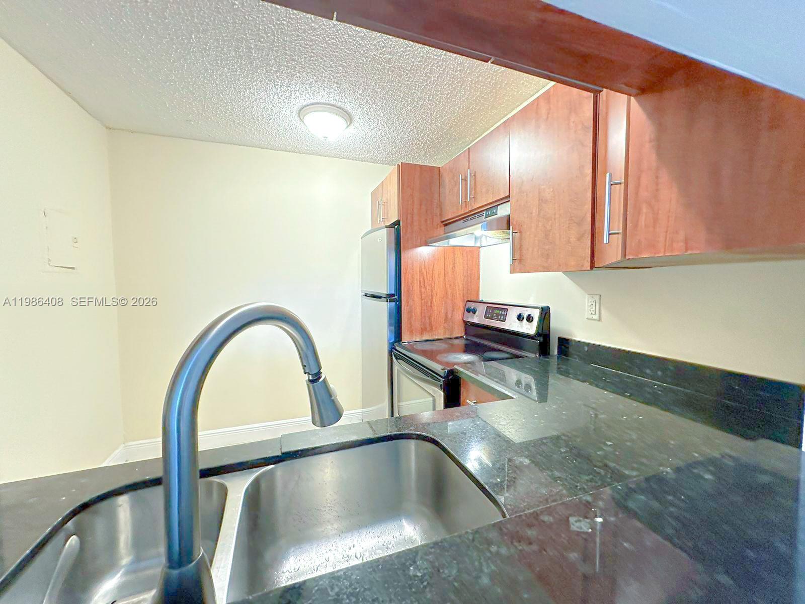 484 Northwest 165th St Road, Unit A412 Miami, FL 33169 - Photo 8 of 22