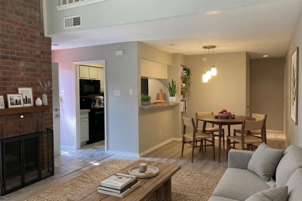 18240 Midway Road, Unit 905 Dallas, TX 75287 - Photo 5 of 17 a living room with furniture and a wooden floor