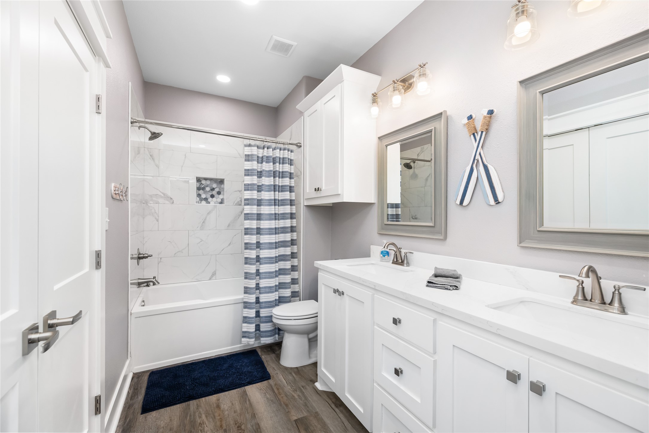 976 Albatros Crystal Beach, TX 77650 - Photo 15 of 30 a bathroom with a sink a toilet and shower