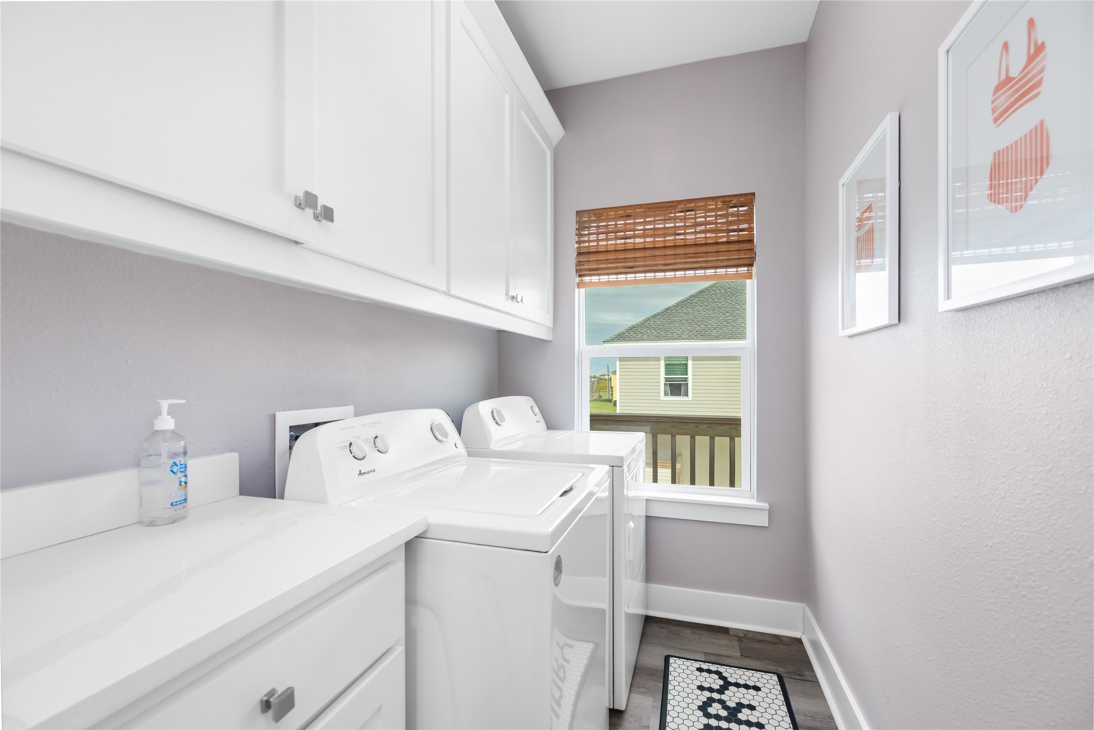 976 Albatros Crystal Beach, TX 77650 - Photo 16 of 30 a utility room with dryer and washer