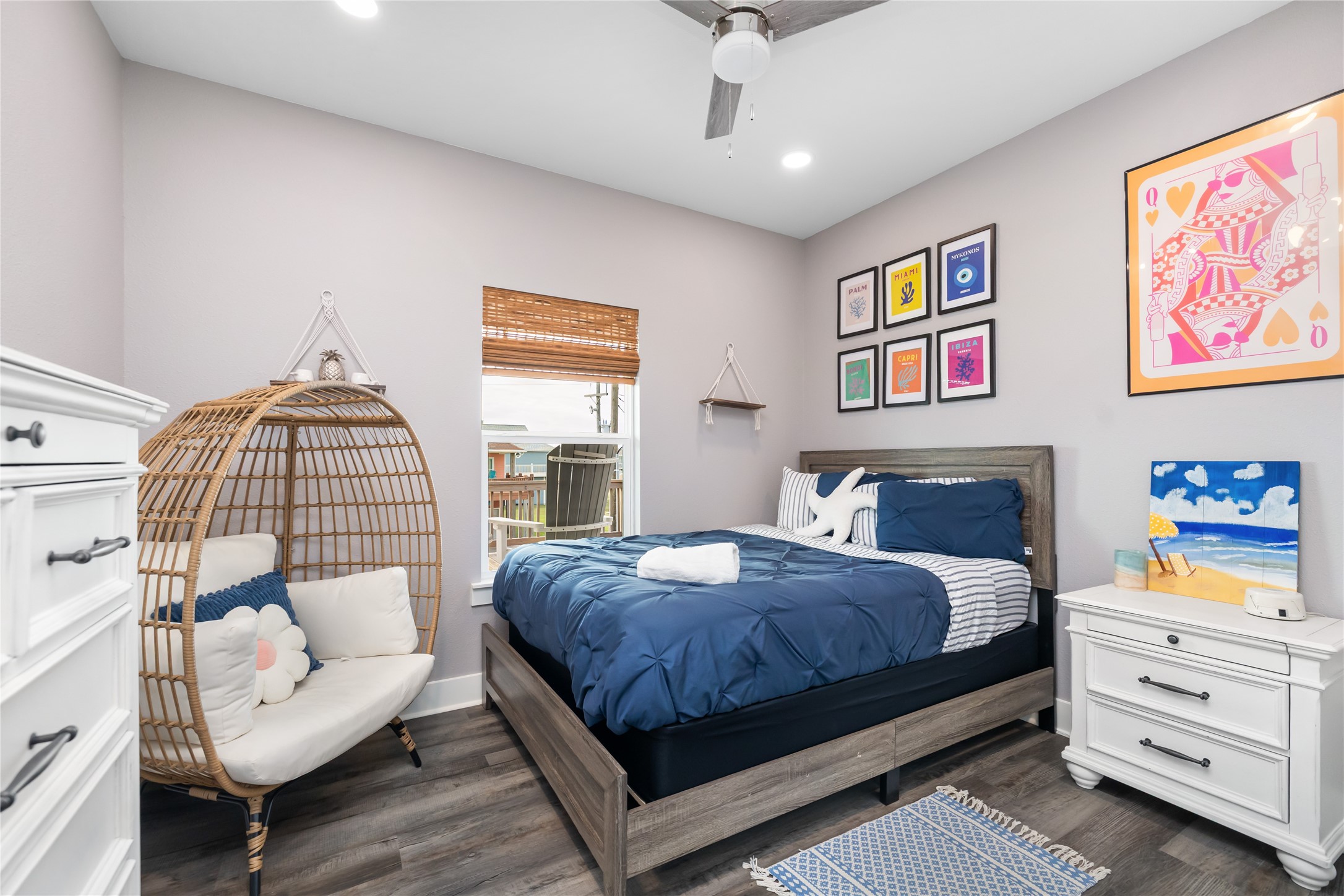 976 Albatros Crystal Beach, TX 77650 - Photo 17 of 30 a bedroom with a bed and a couch