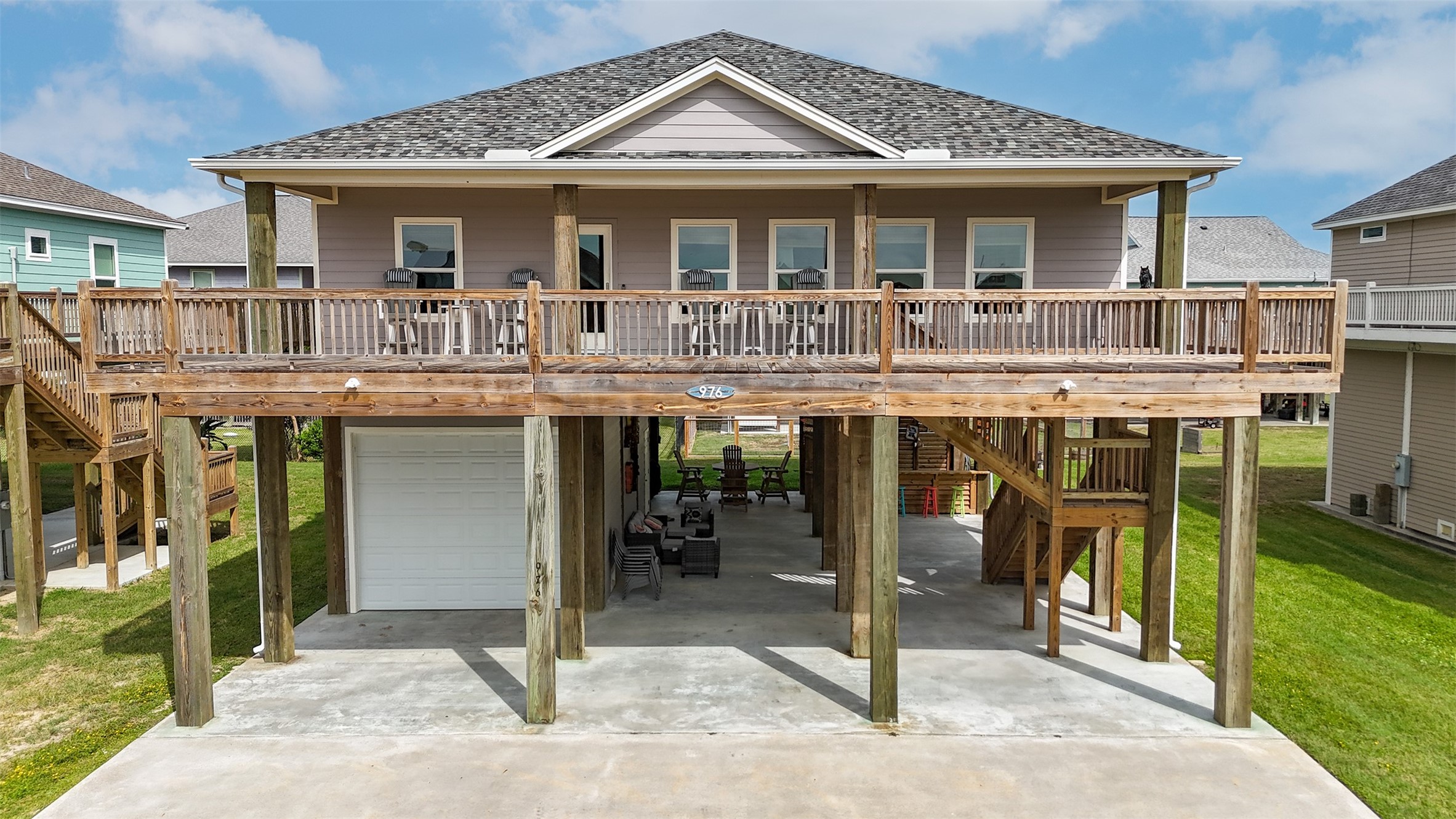 976 Albatros Crystal Beach, TX 77650 - Photo 2 of 30 a view of a house with a outdoor space