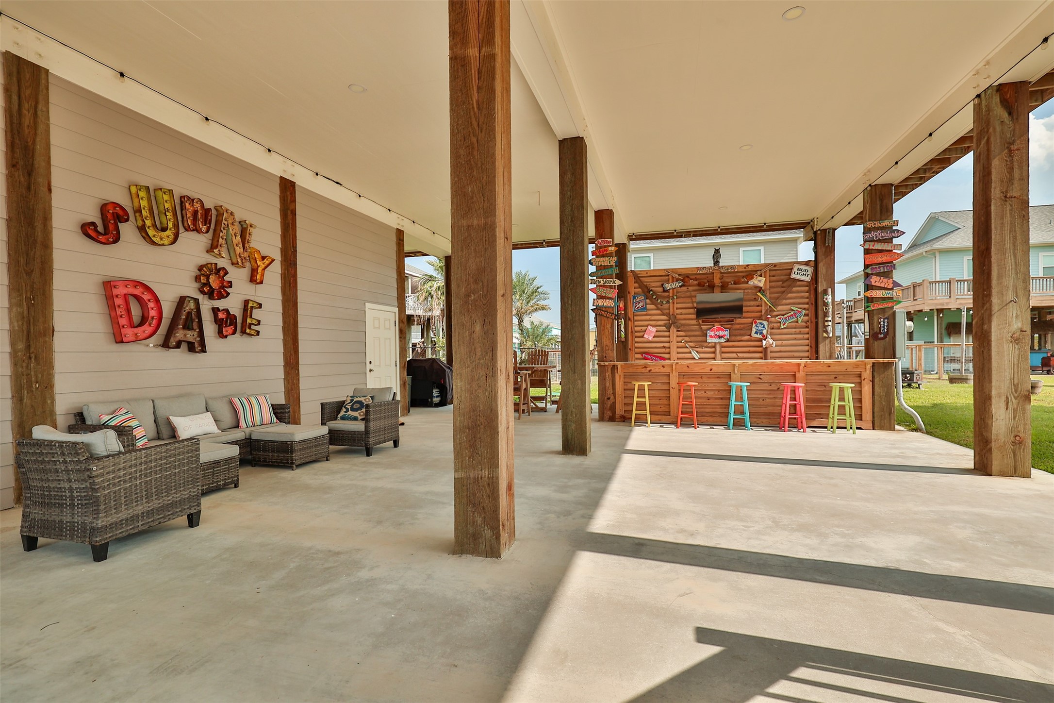976 Albatros Crystal Beach, TX 77650 - Photo 23 of 30 a bedroom with furniture and large window